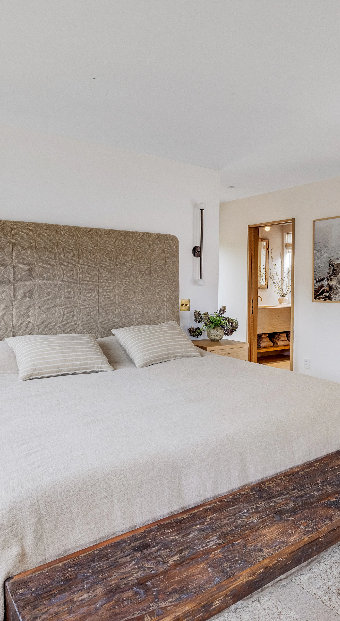 Find comfort in this stylish master suite, where modern design meets cozy touches, making it a perfect retreat after a day of exploration.