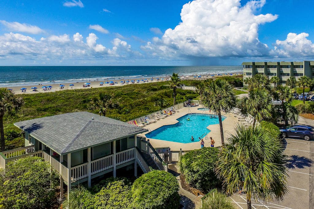 Ocean front condo villa near restaurants & state park with beach access, pool & pier — Isle of Palms, SC — vacation rental