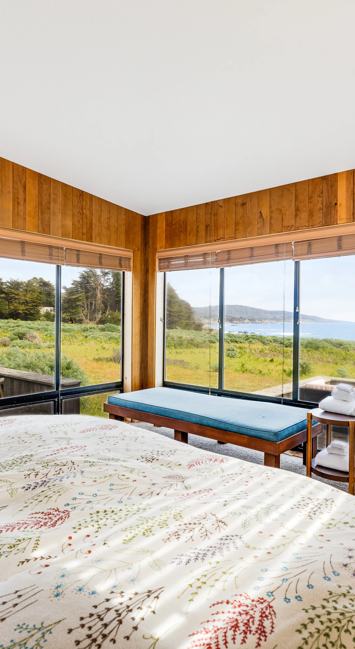 Breathe in the coastal air from your master suite, featuring expansive windows that frame breathtaking ocean views.