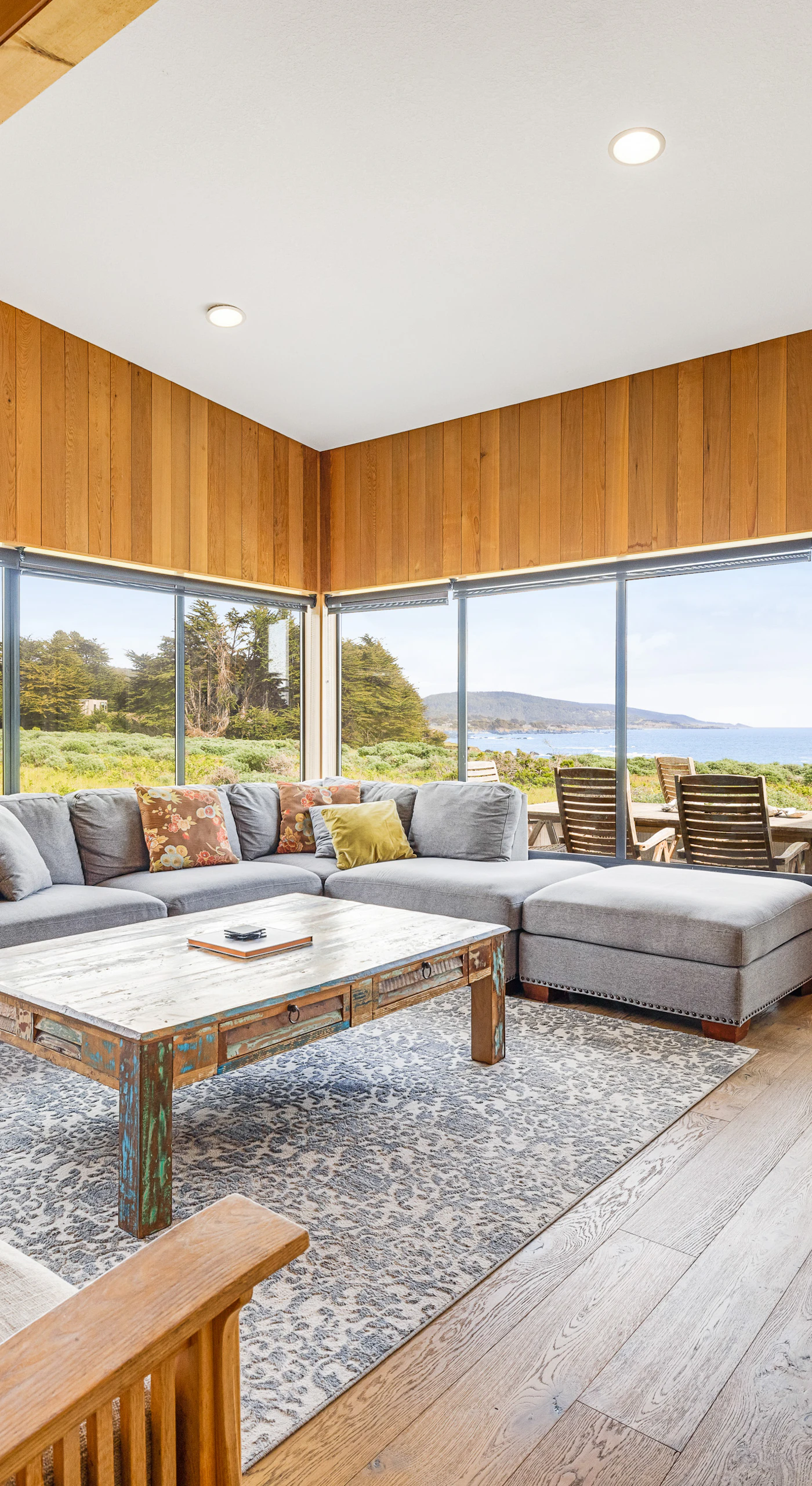 Picture yourself lounging on the plush sectional, soaking in the stunning views while the waves serenade you in the background.