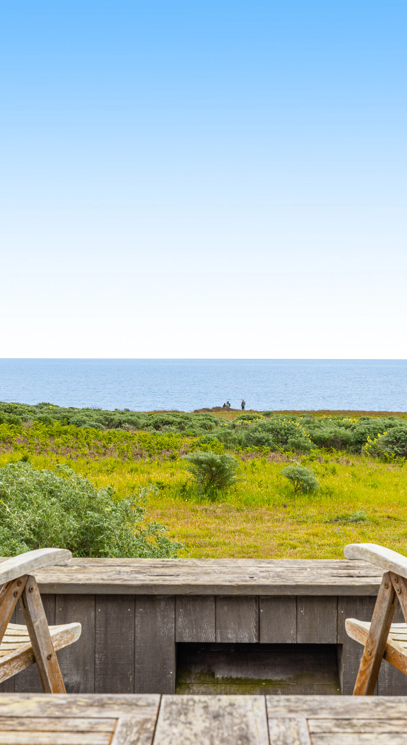 Take a moment to savor the scenery from your private deck, where tranquility and stunning ocean views create an idyllic setting.