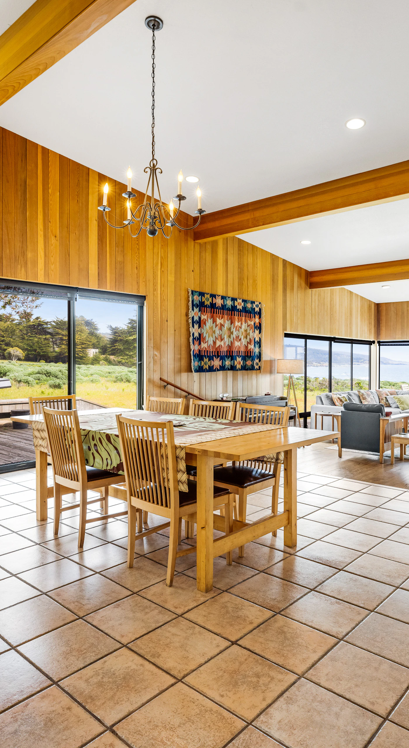 Enjoy meals with a view in this spacious dining area, where the beauty of the coastal landscape enhances every gathering.