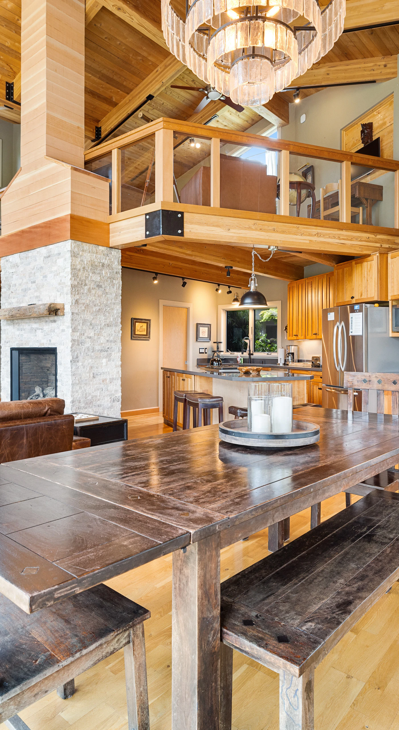 The open-concept living space invites you to enjoy quality time with family, surrounded by warmth and coastal charm.