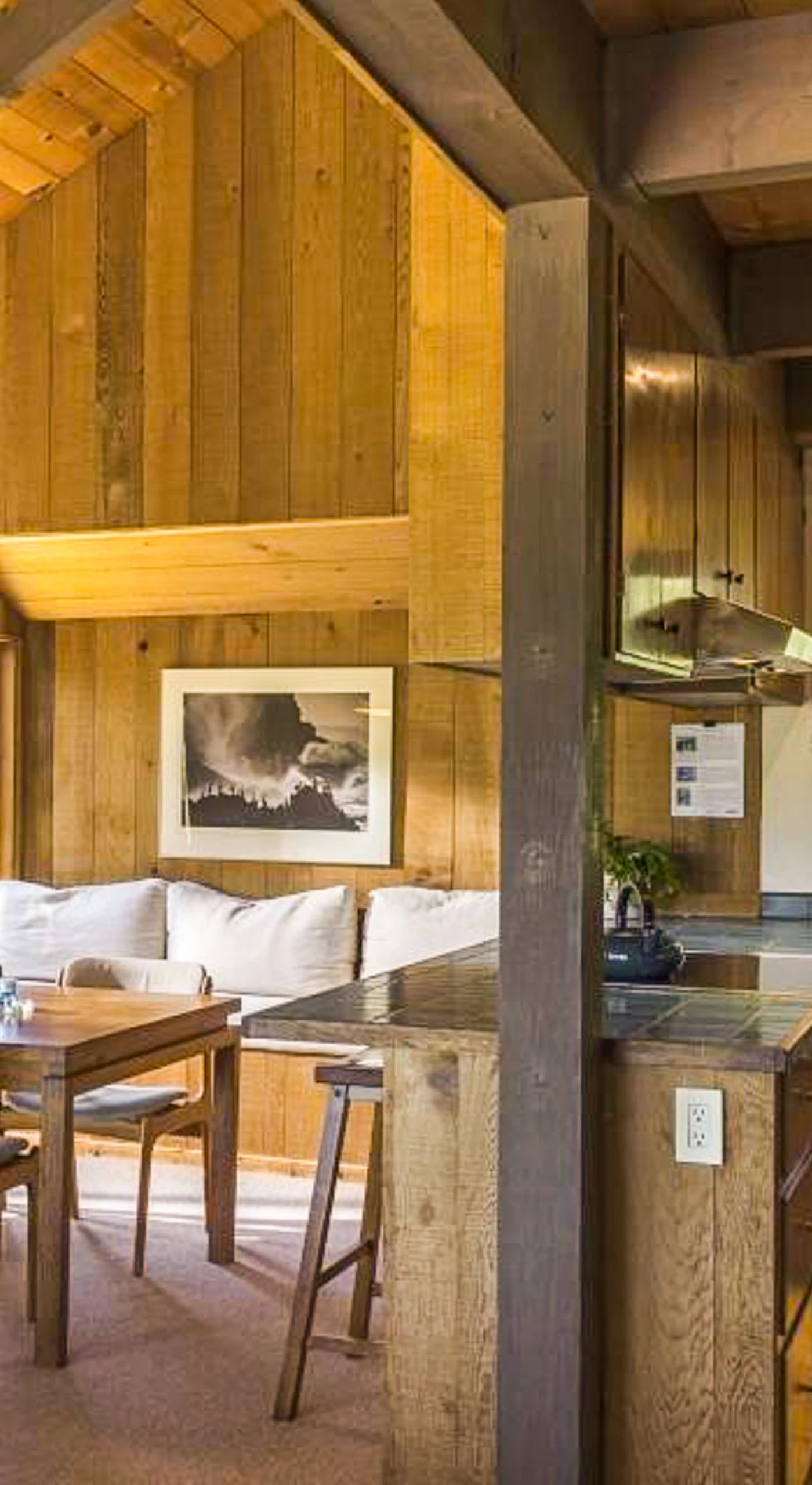 Cook up your favorite meals in this well-equipped kitchen, where modern amenities meet rustic charm for a delightful culinary experience.