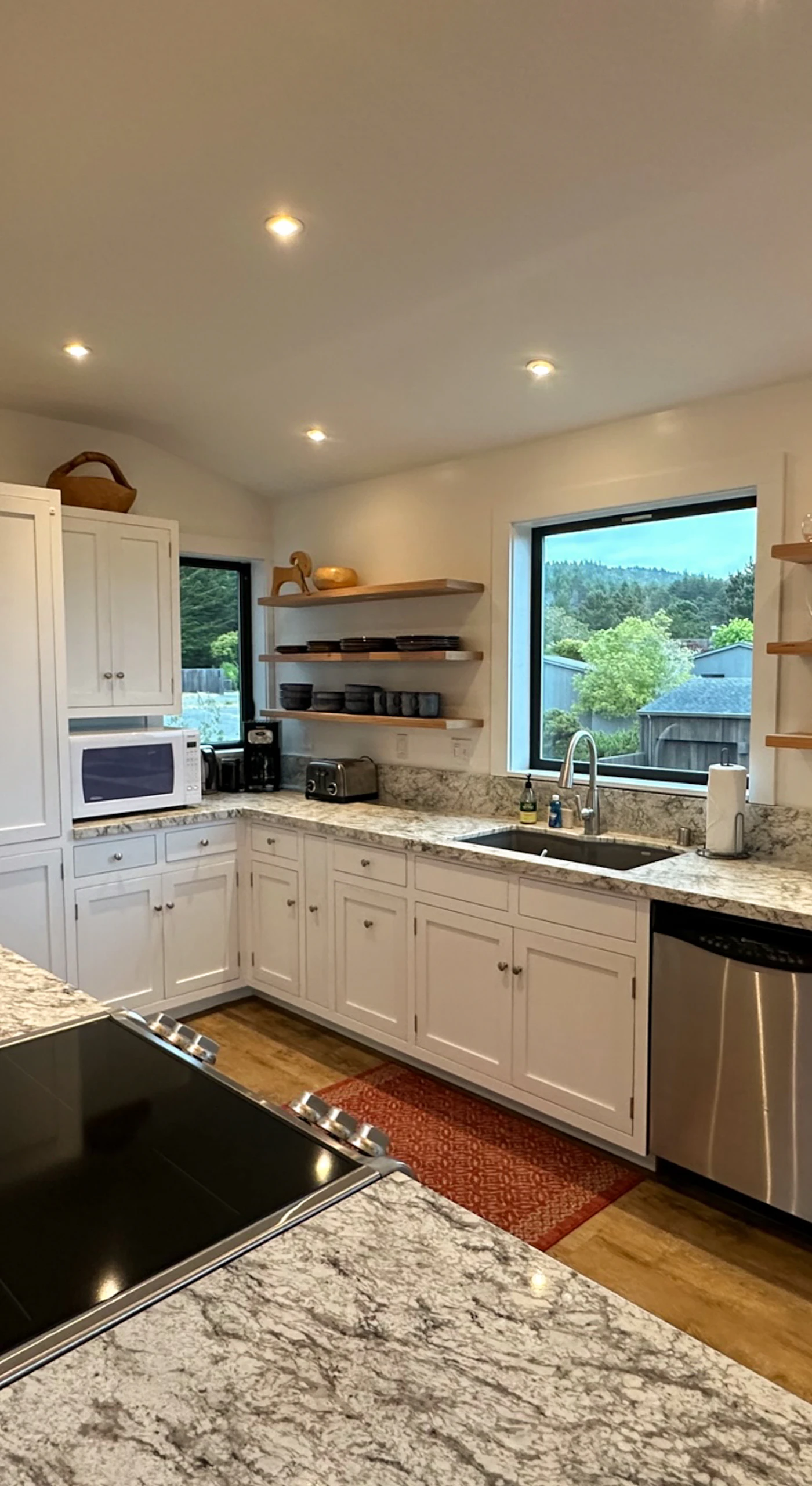 Craft your culinary masterpieces in this modern kitchen, equipped with everything you need for delightful meals during your stay.