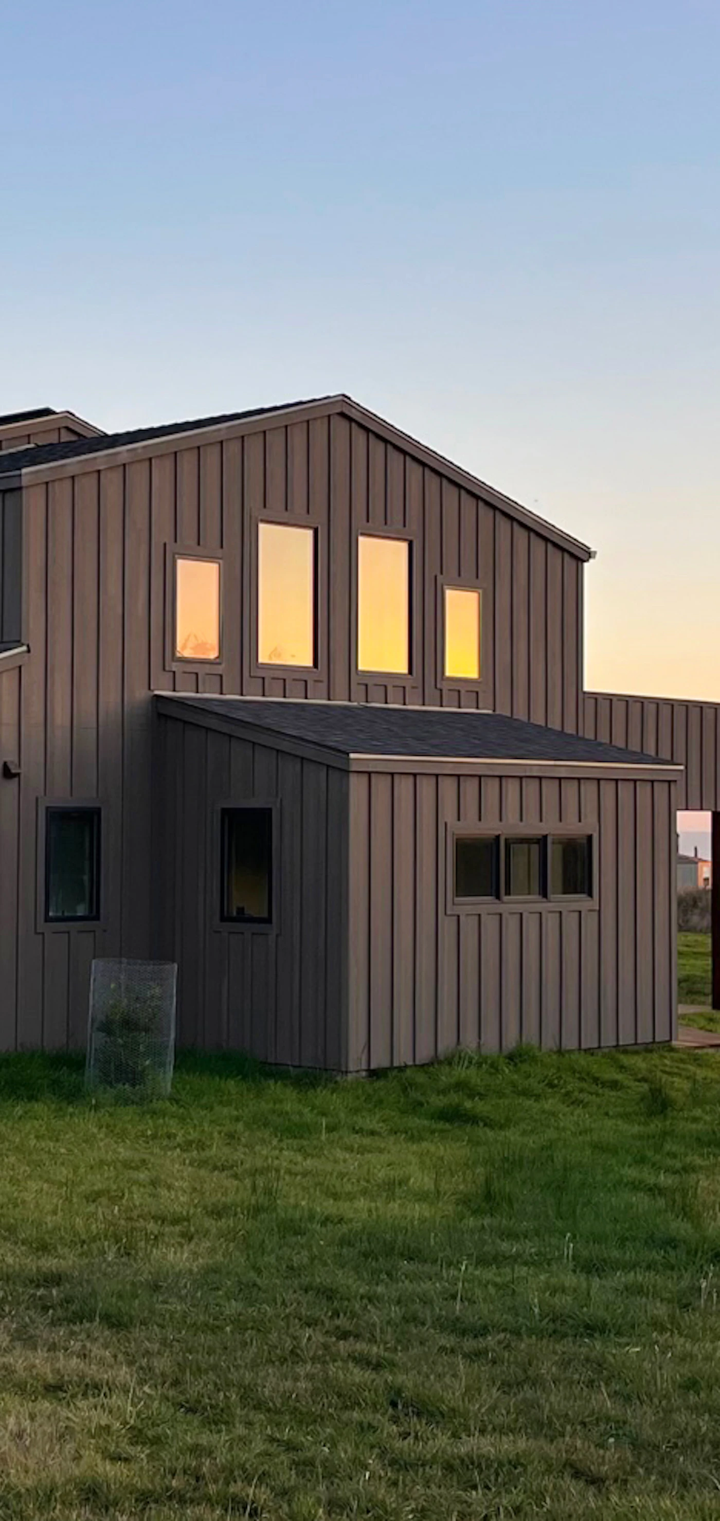 As the sun sets over the ocean, this coastal retreat welcomes you to unwind in its serene surroundings.
