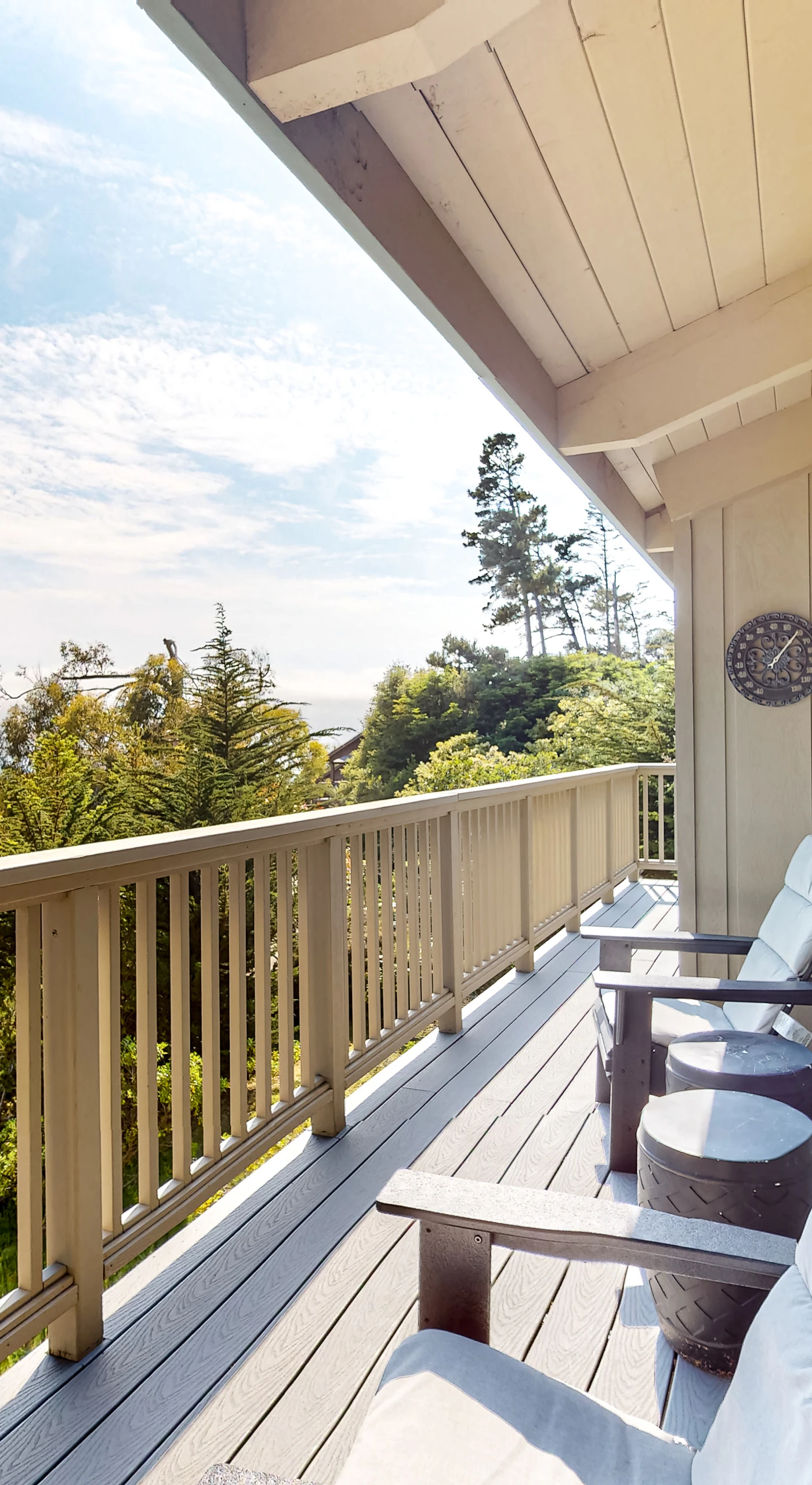 Step onto the spacious deck and savor your morning coffee, surrounded by the serene sounds of nature and breathtaking ocean vistas.