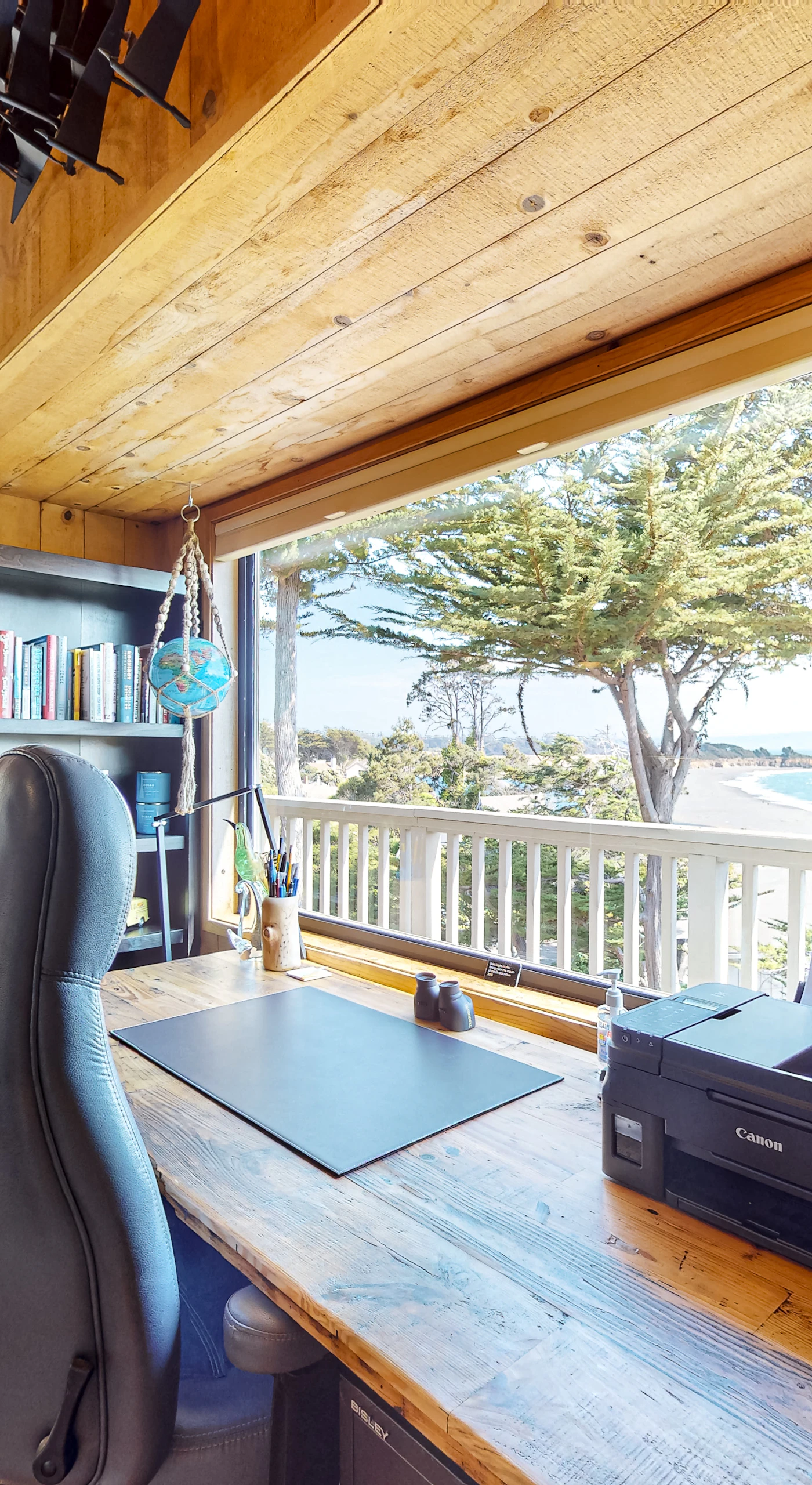 Your cozy office nook invites creativity, with stunning views reminding you to take breaks and savor the beauty outside.