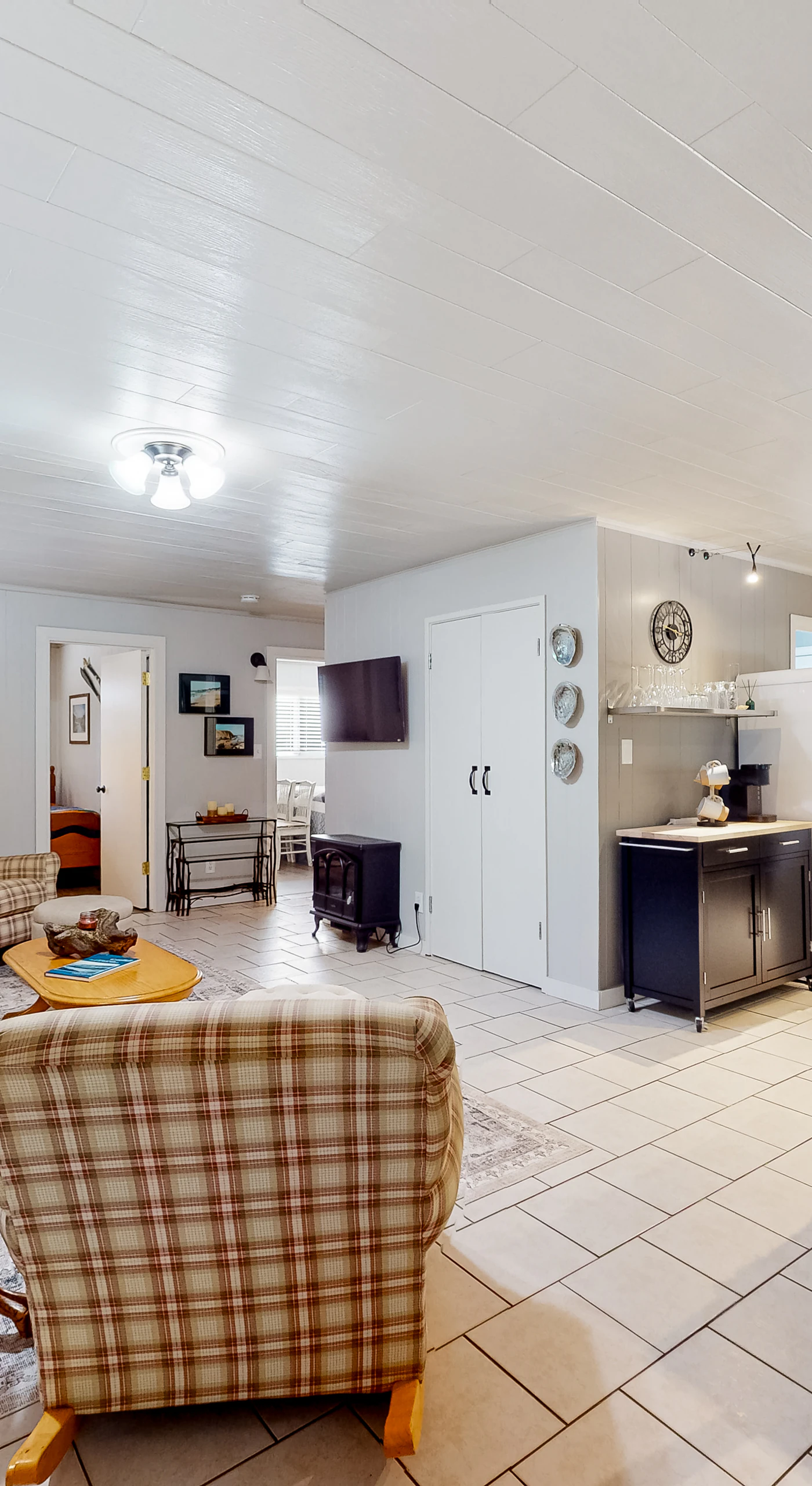 Feel at home in the inviting living room, perfect for cozy evenings with loved ones or a good book by the fire.