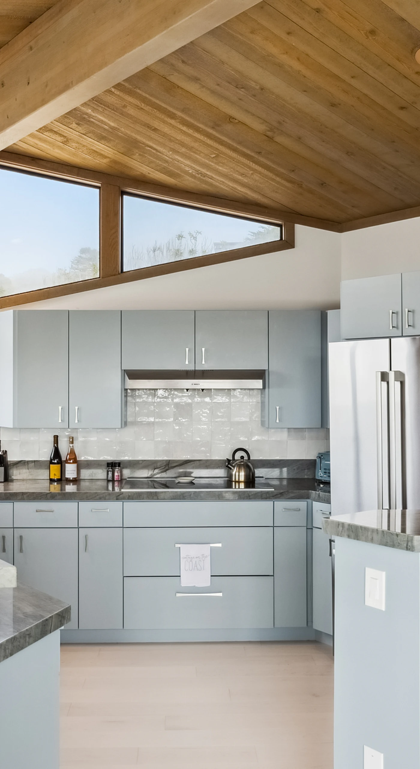 Channel your inner chef in this gourmet kitchen with granite counters, stainless steel appliances, and Bodega Bay views from every window