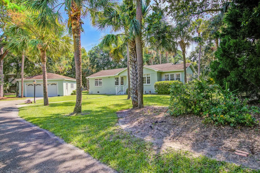 Refined coastal home surrounded by palms with large deck & athletic court access — Isle of Palms, SC — vacation rental