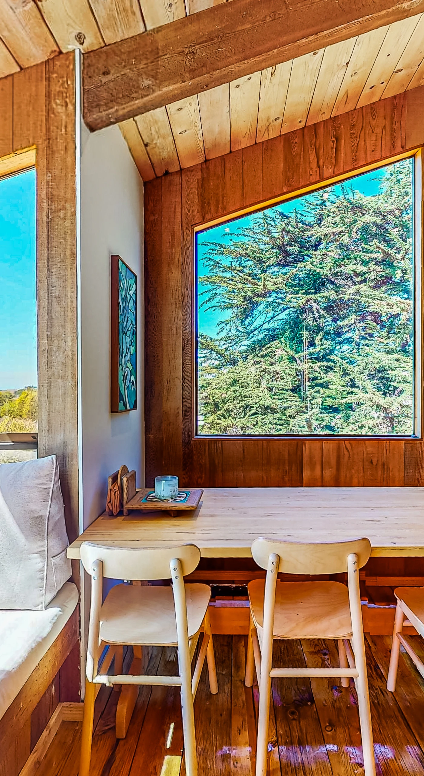Elevate your mornings with coffee by the fireplace in this inviting lounge, where warmth and comfort await.