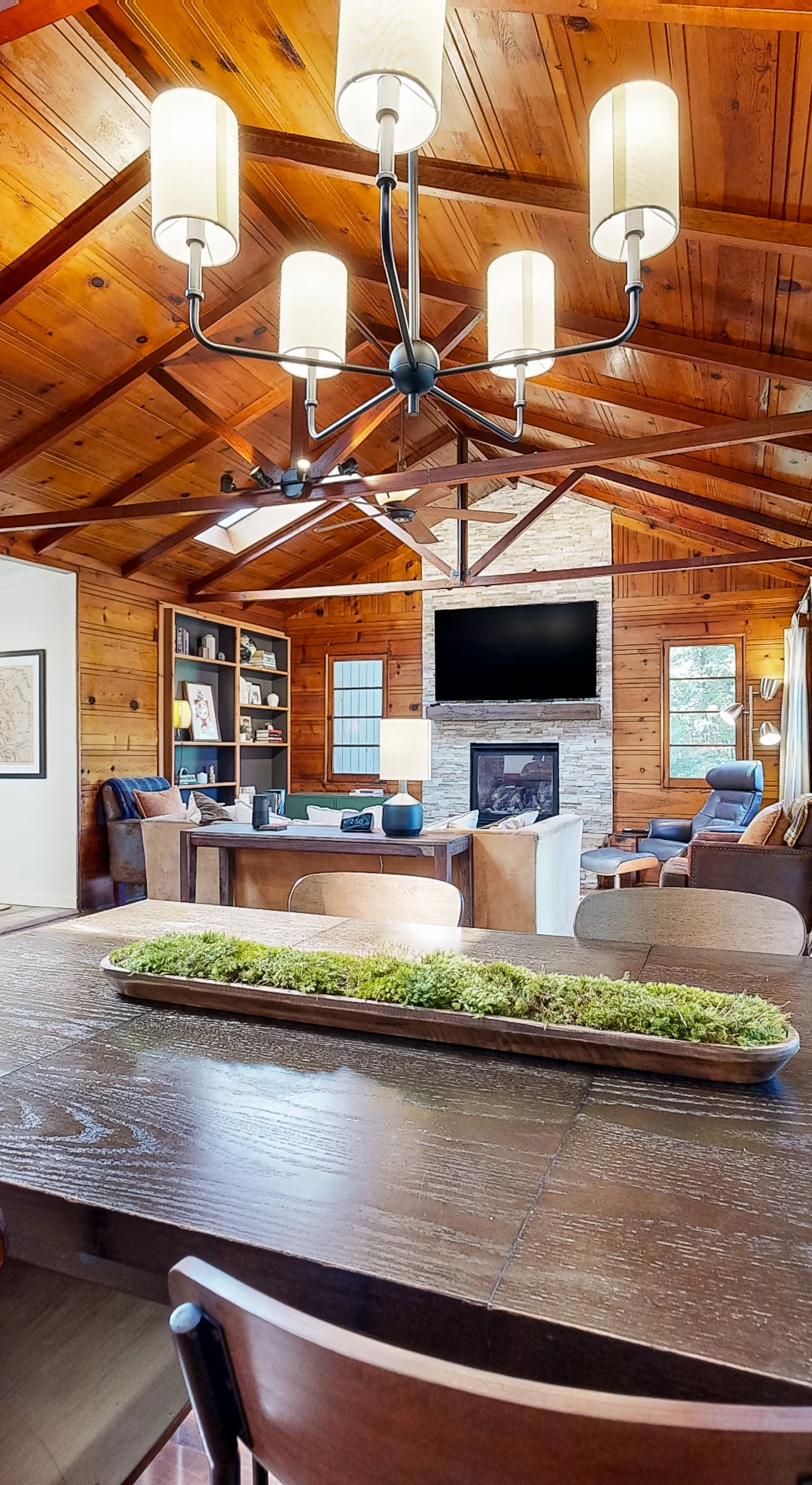 Host a wine-country dinner for six at the handsome wood table — open sightlines to the living room keep everyone connected.