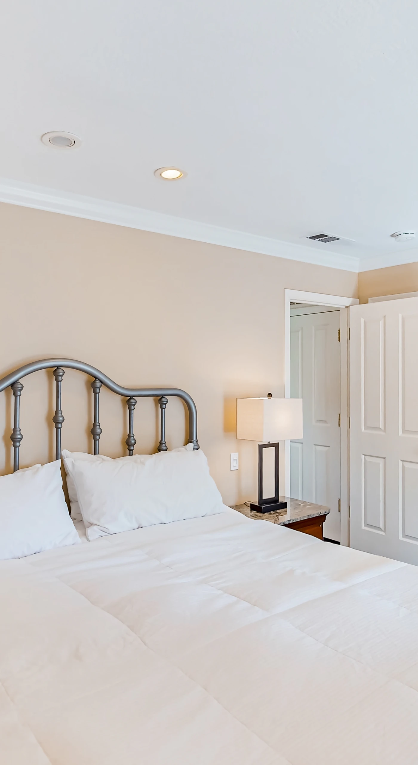 Drift off in your plush king bed with crisp white linens and bedside reading lamps — your en-suite bathroom is just steps away for ultimate Napa Valley comfort