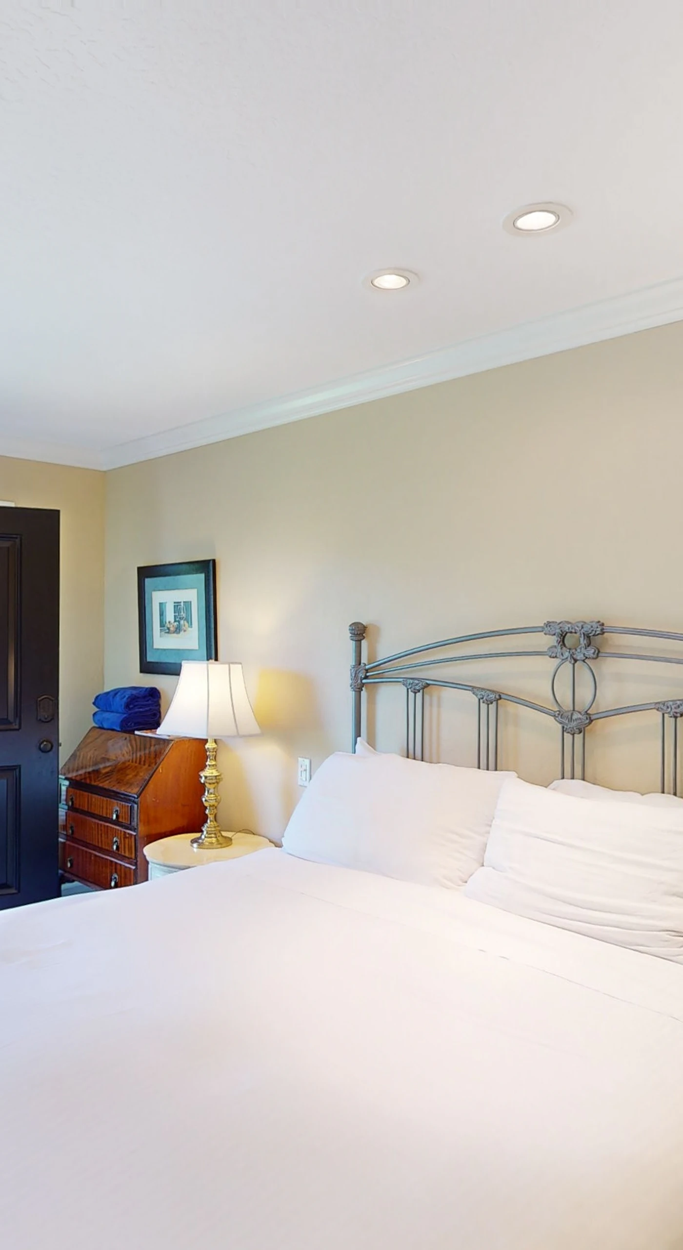 Wake up to natural light streaming through your bedroom's sliding glass door — step right outside onto the resort grounds to start your Napa morning.