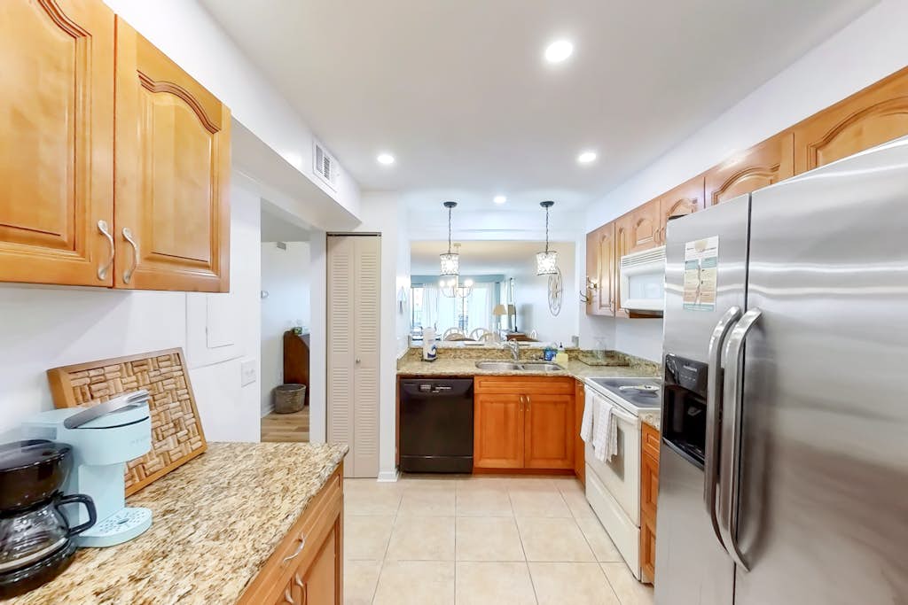 Coastal condo with beach and pool access balcony WD central air and water views — Indian Shores, FL — vacation rental