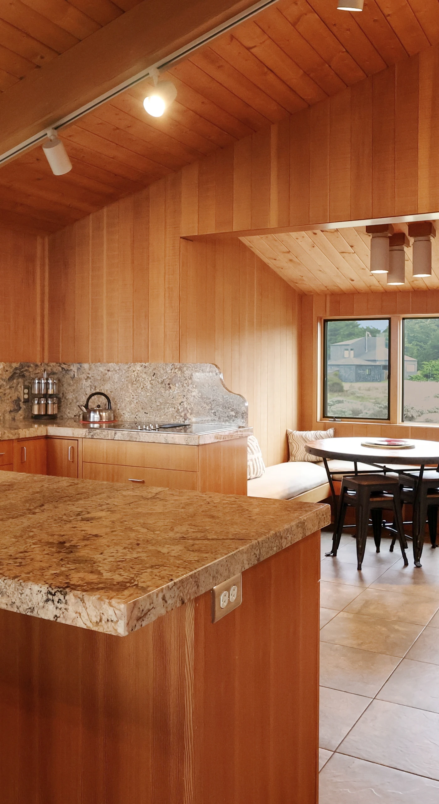 Cook up your favorite meals in the spacious kitchen, where modern amenities meet the warmth of wooden accents.