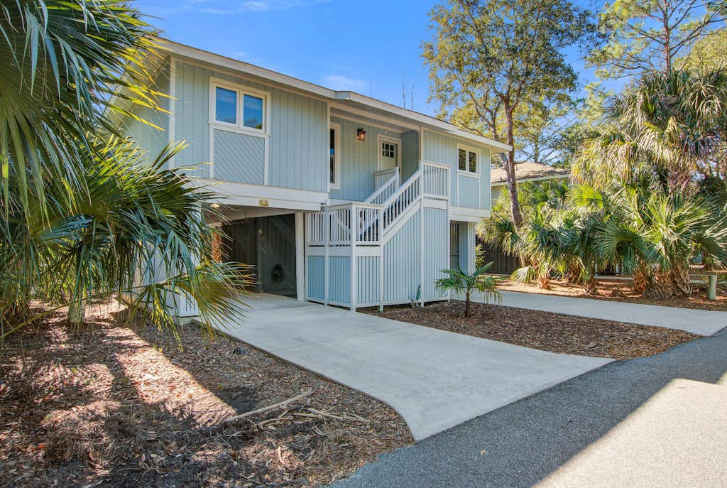 Palm-surrounded abode with screened-in balcony, chef's kitchen, smart TVs, & W/D — Isle of Palms, SC — vacation rental