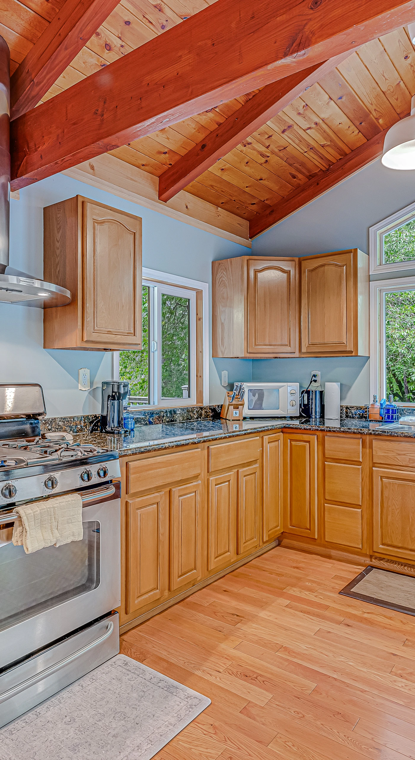 Channel your inner chef in this fully equipped kitchen with granite counters, a gas range, and stainless hood — ready for your Sonoma farmers market haul.