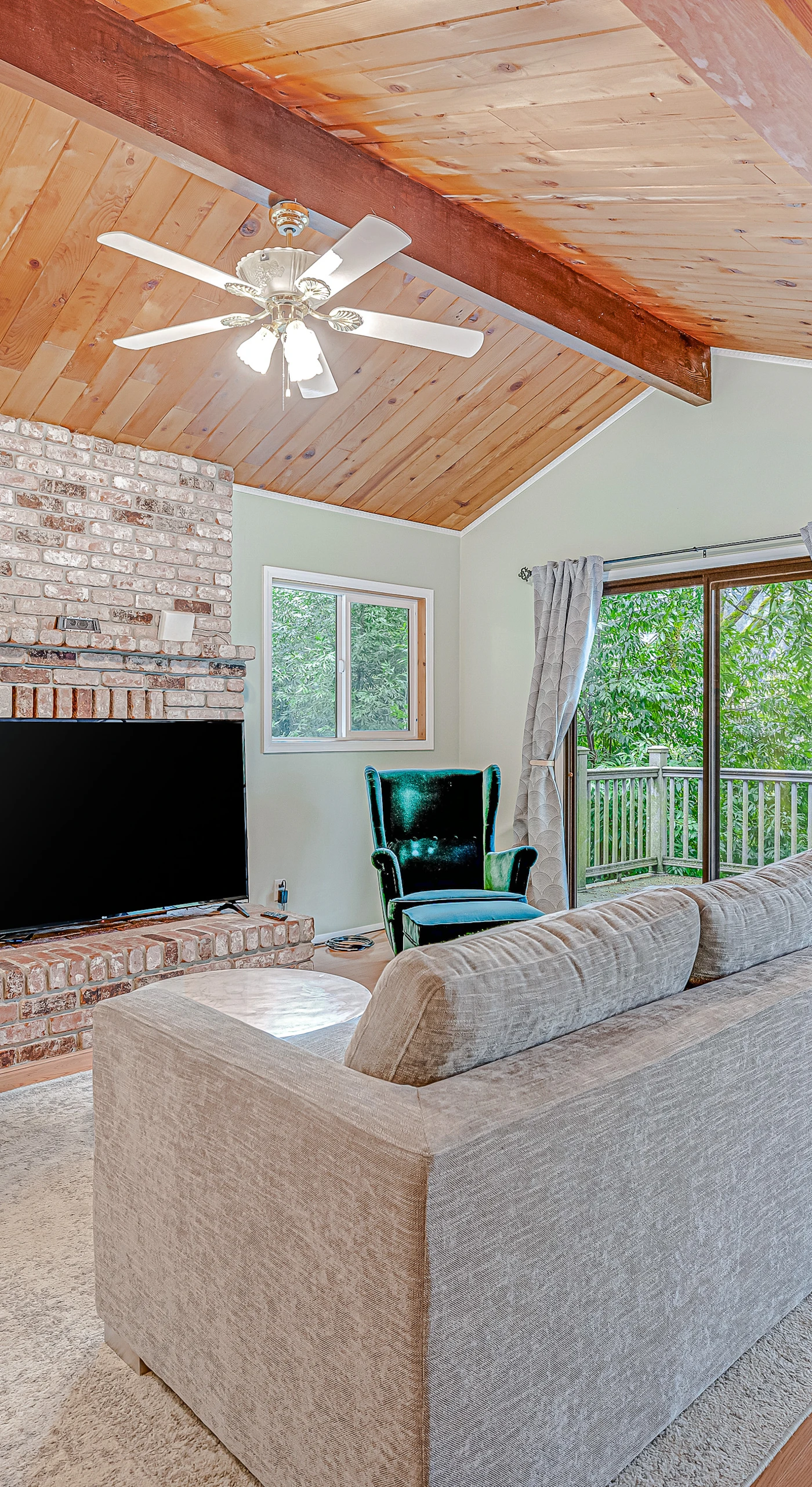 Settle into your vaulted great room where warm wood ceilings, a brick hearth, and plush seating make the perfect spot to recap your Sonoma tasting adventures.