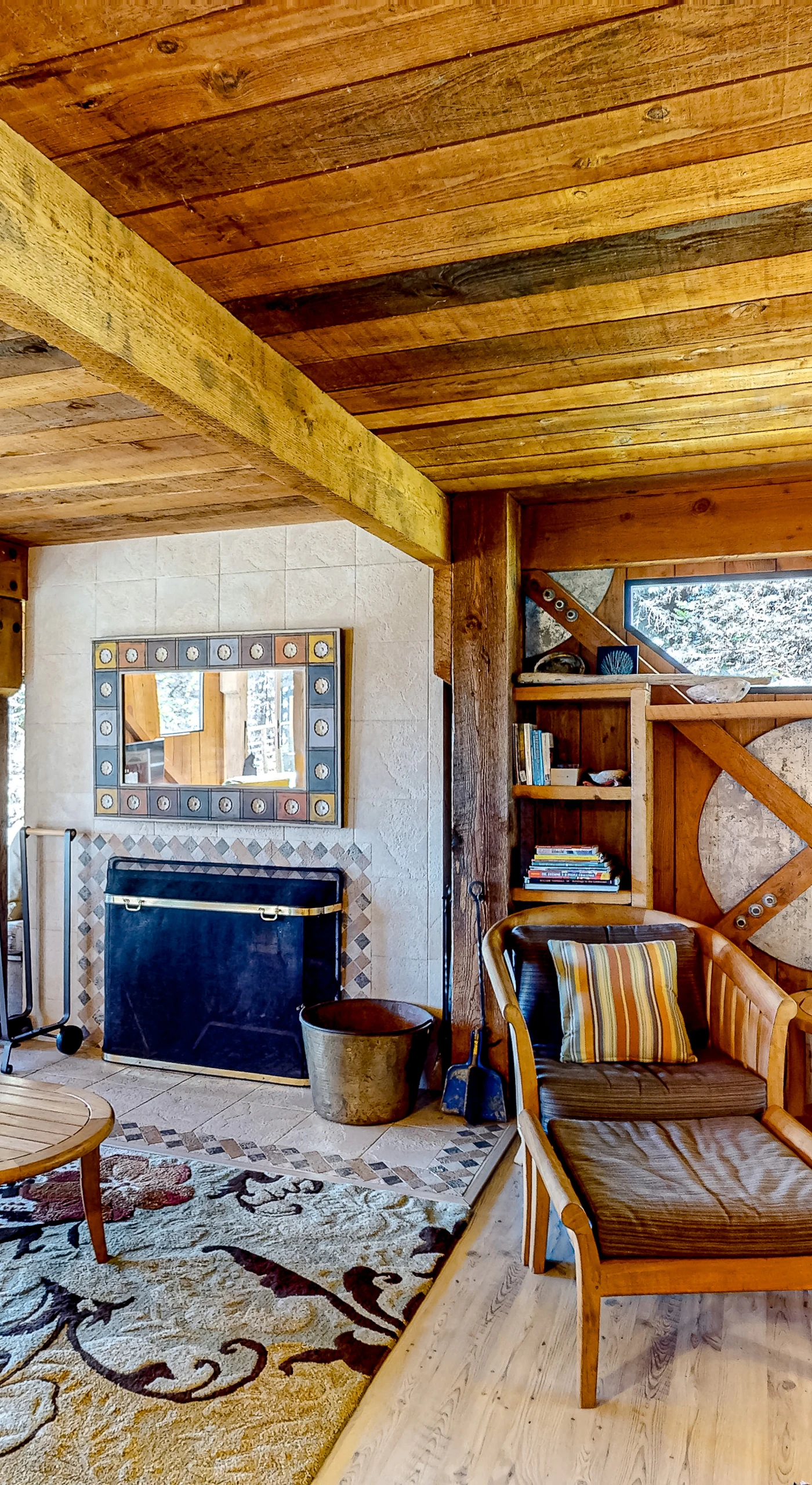 Bask in the warmth of the wood-burning fireplace while you enjoy panoramic ocean views from the comfort of the inviting living space.