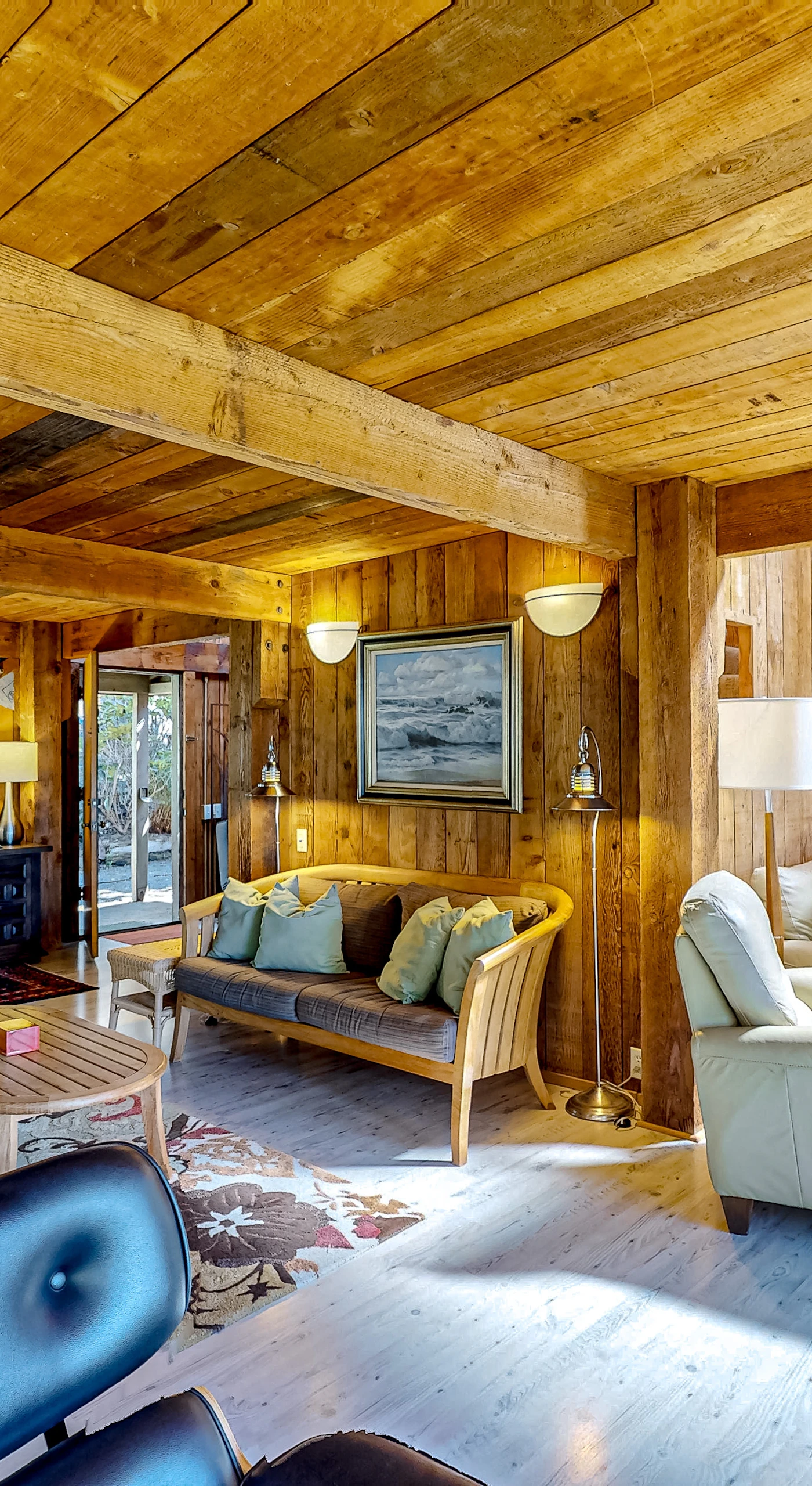 With its open layout, this living area seamlessly blends comfort and style, making it ideal for entertaining or simply enjoying quiet moments.