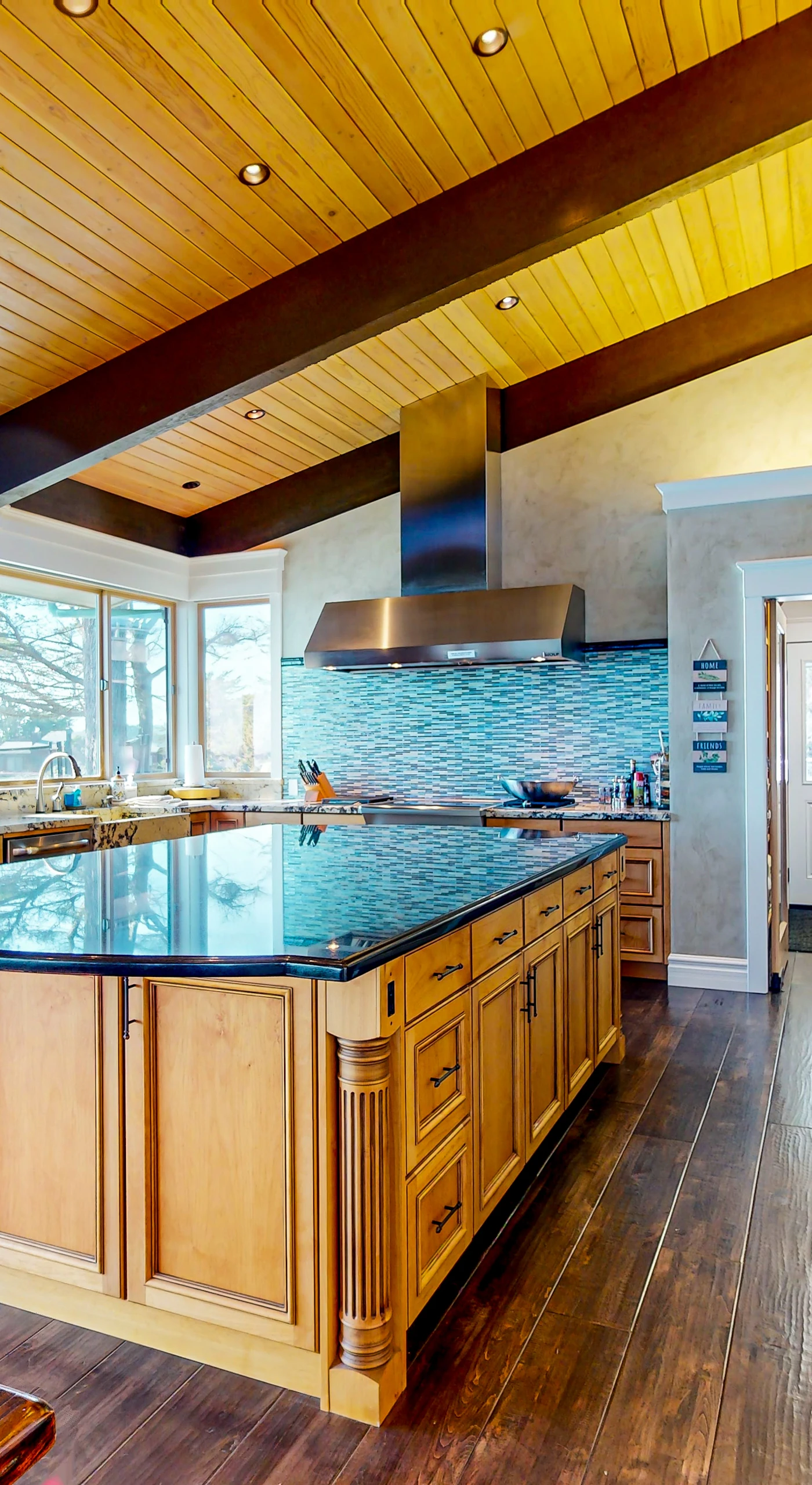 The heart of your vacation awaits in this stylish kitchen, designed for both cooking and enjoying the breathtaking scenery.