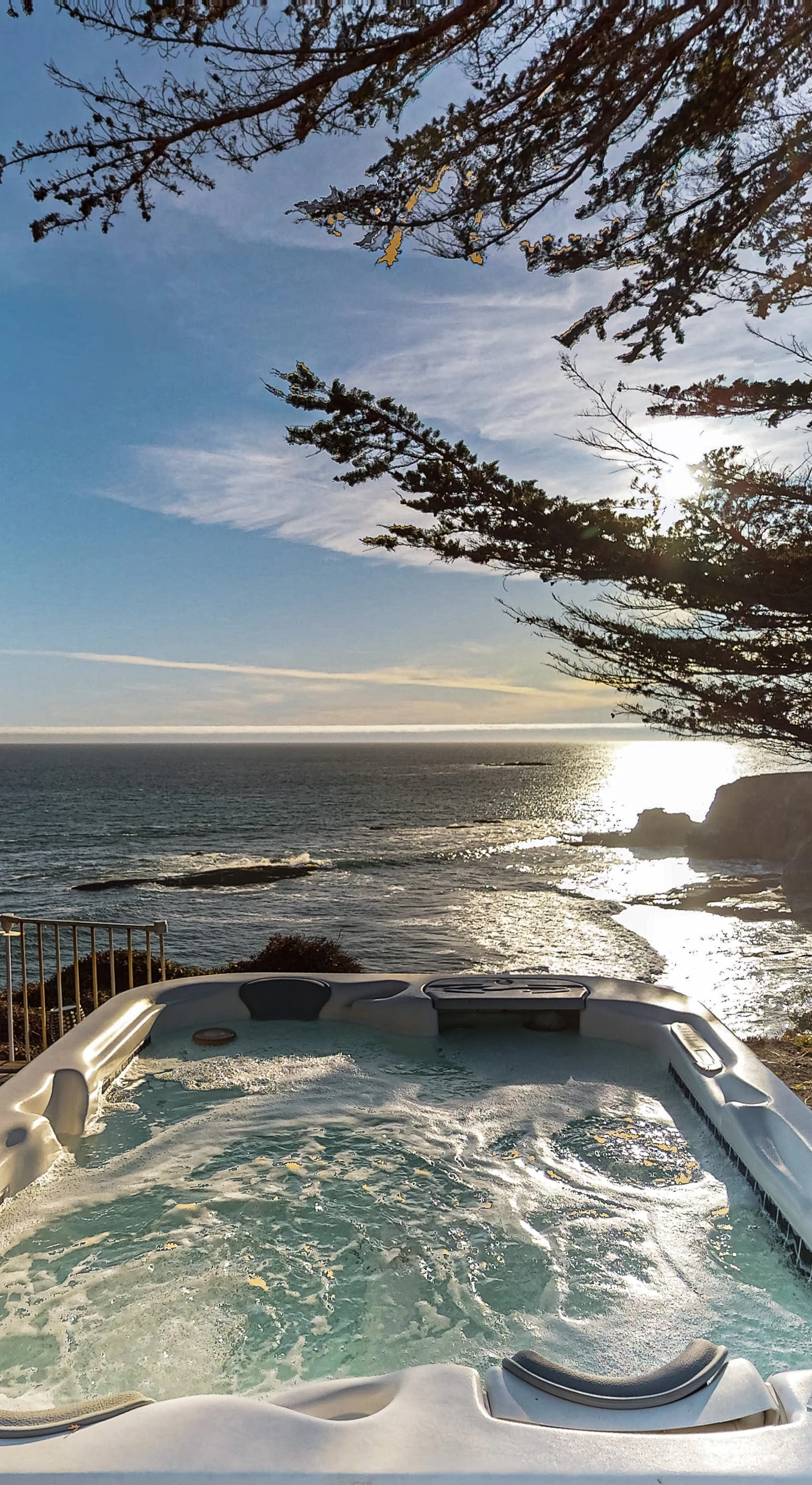 Soak in the private hot tub as the sun sets over the Pacific, turning your getaway into a serene, unforgettable experience.