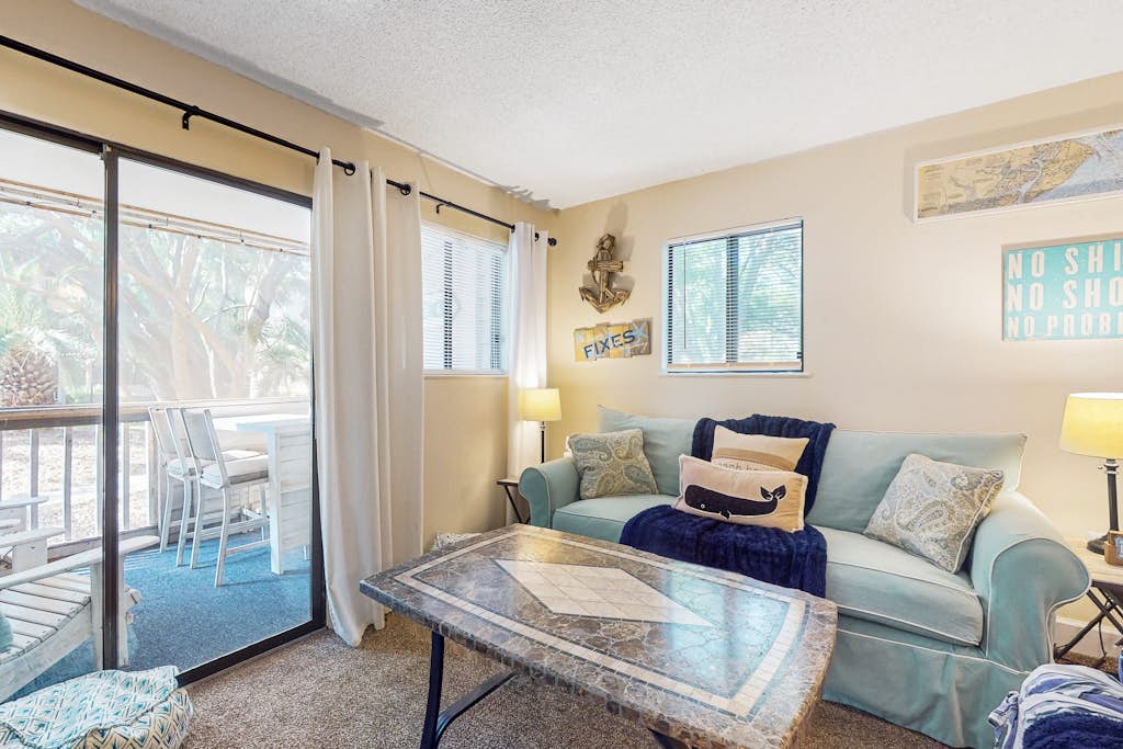 Condo by the beach with heated pools, hot tub, patio, tennis, central AC, & W/D — Hilton Head, SC — vacation rental