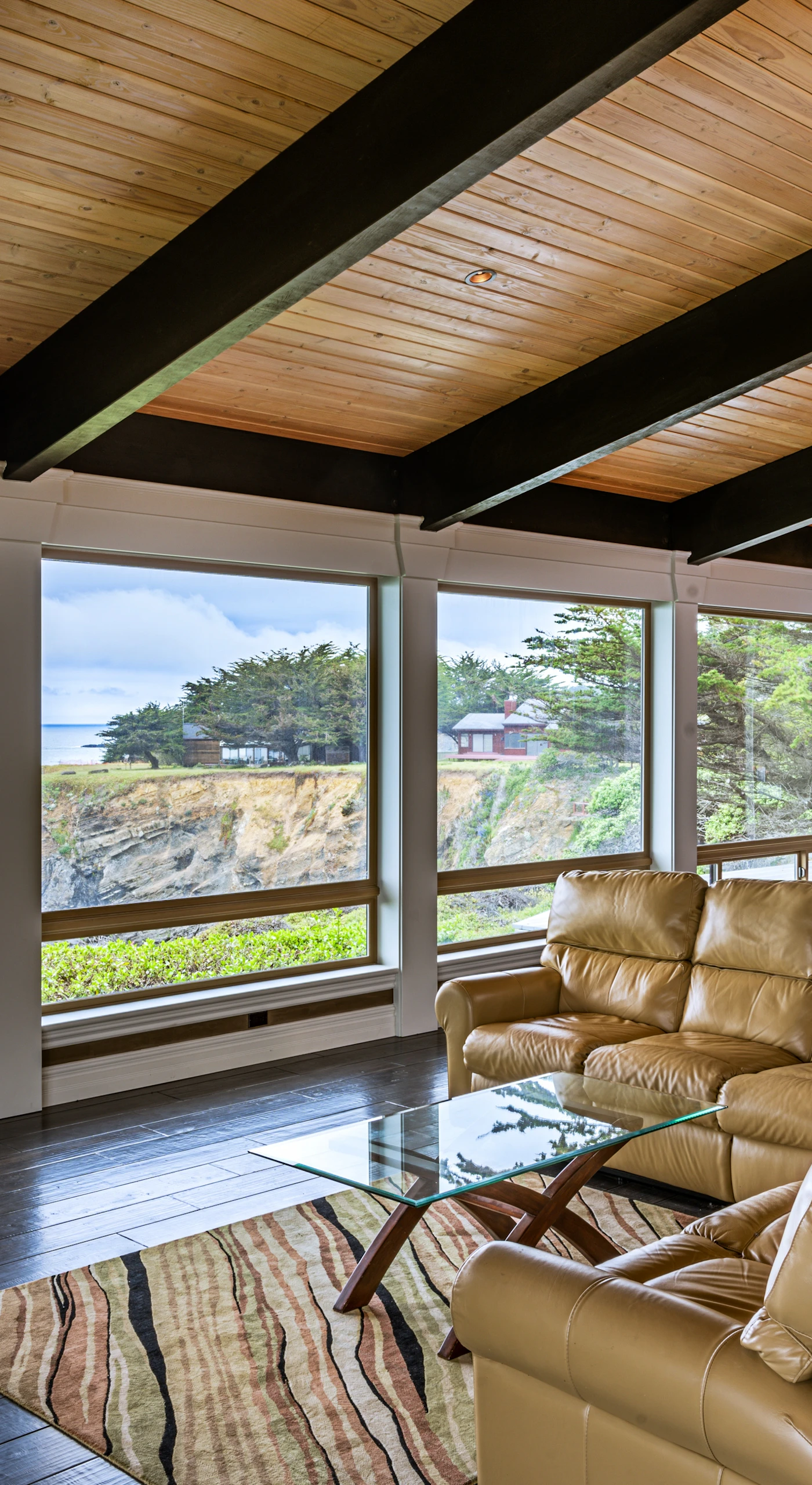 Witness the beauty of coastal living from this stunning living space, where the ocean is your ever-changing backdrop.