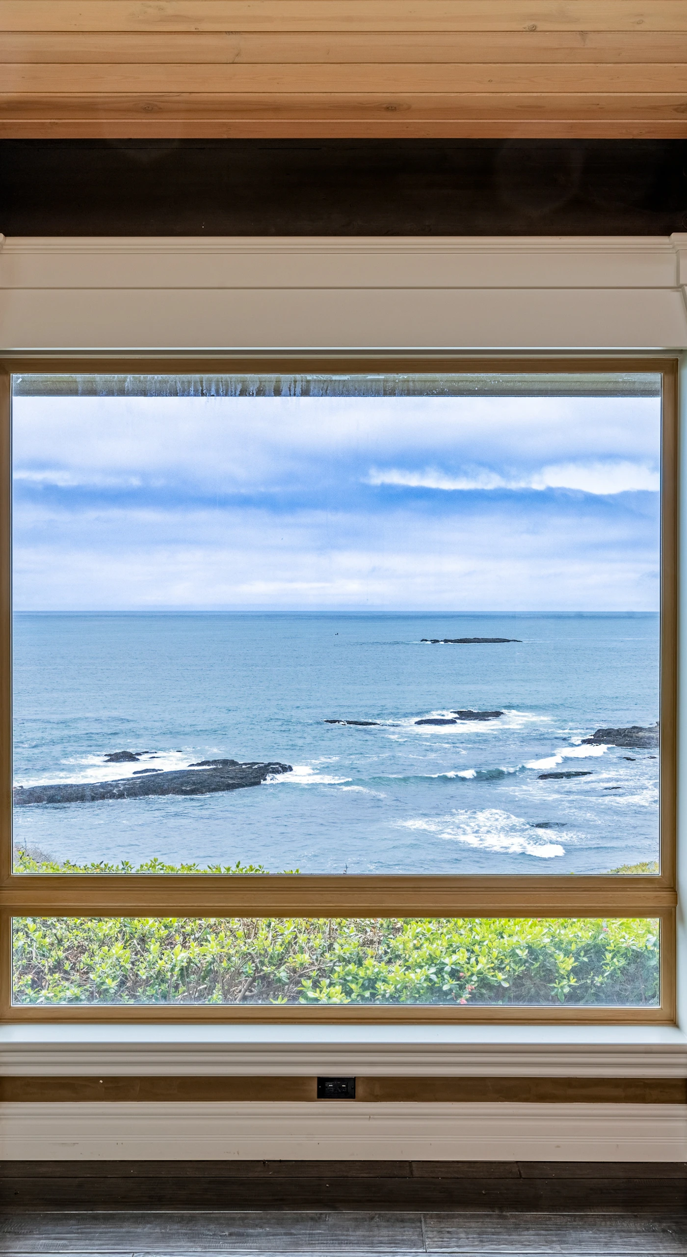 Gaze out at the tranquil waves from this beautiful vantage point, where every moment feels like a postcard.