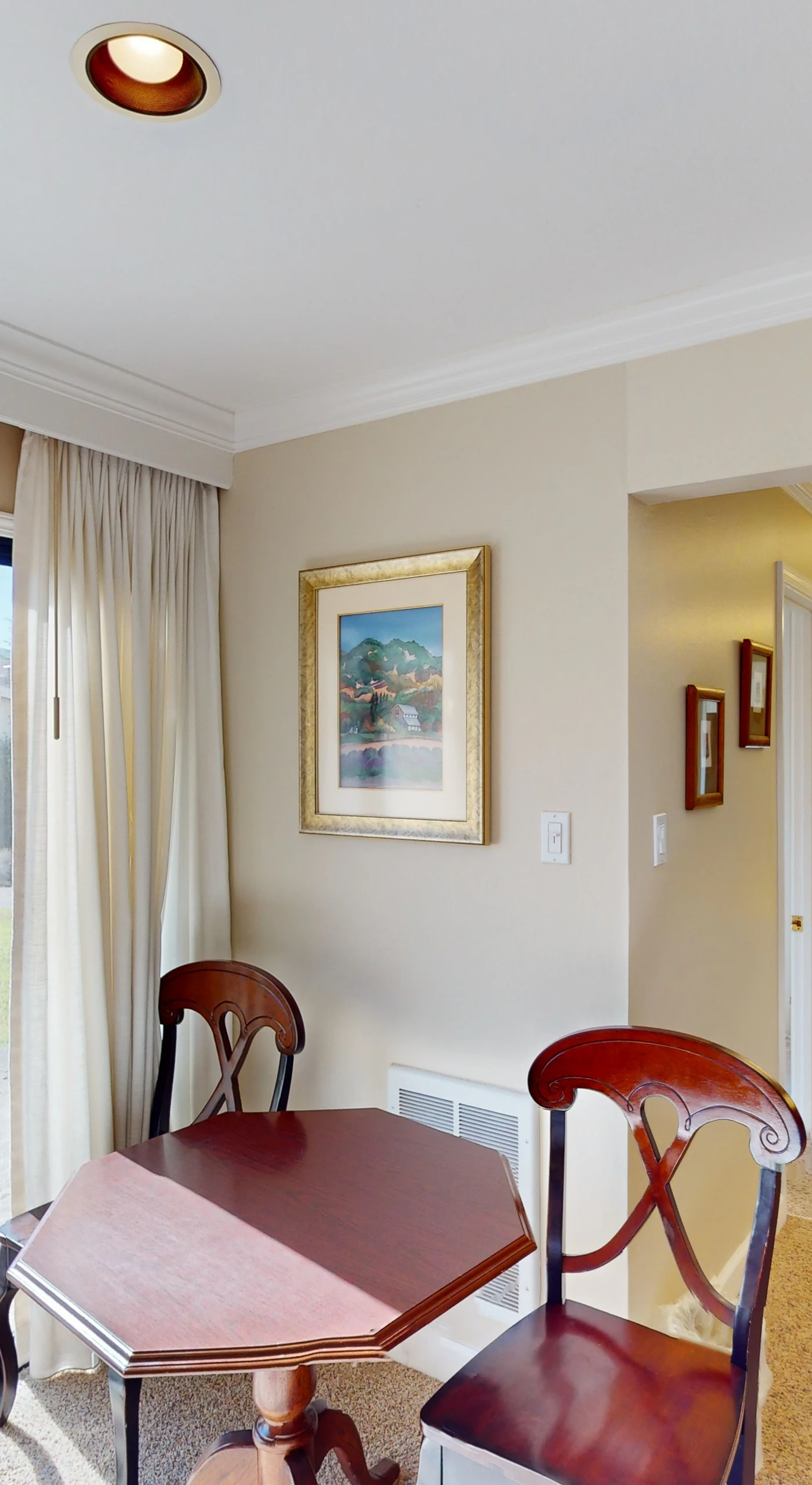 Settle into your private dining nook overlooking Silverado's manicured greens — sliding glass doors flood your Napa retreat with natural light