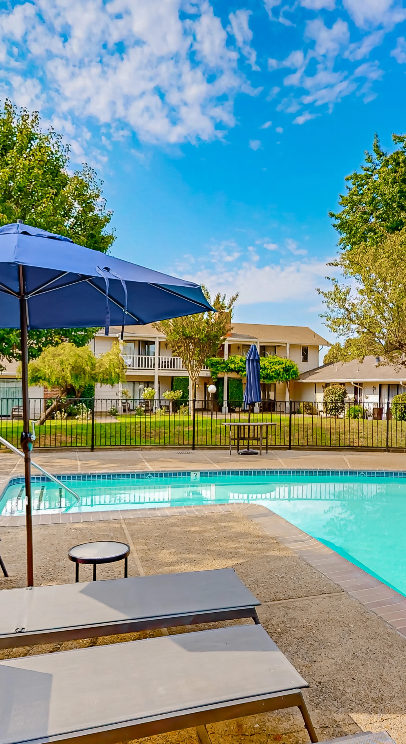 Cool off under shaded loungers beside your resort pool — the perfect reward after a day of Napa Valley tasting room adventures