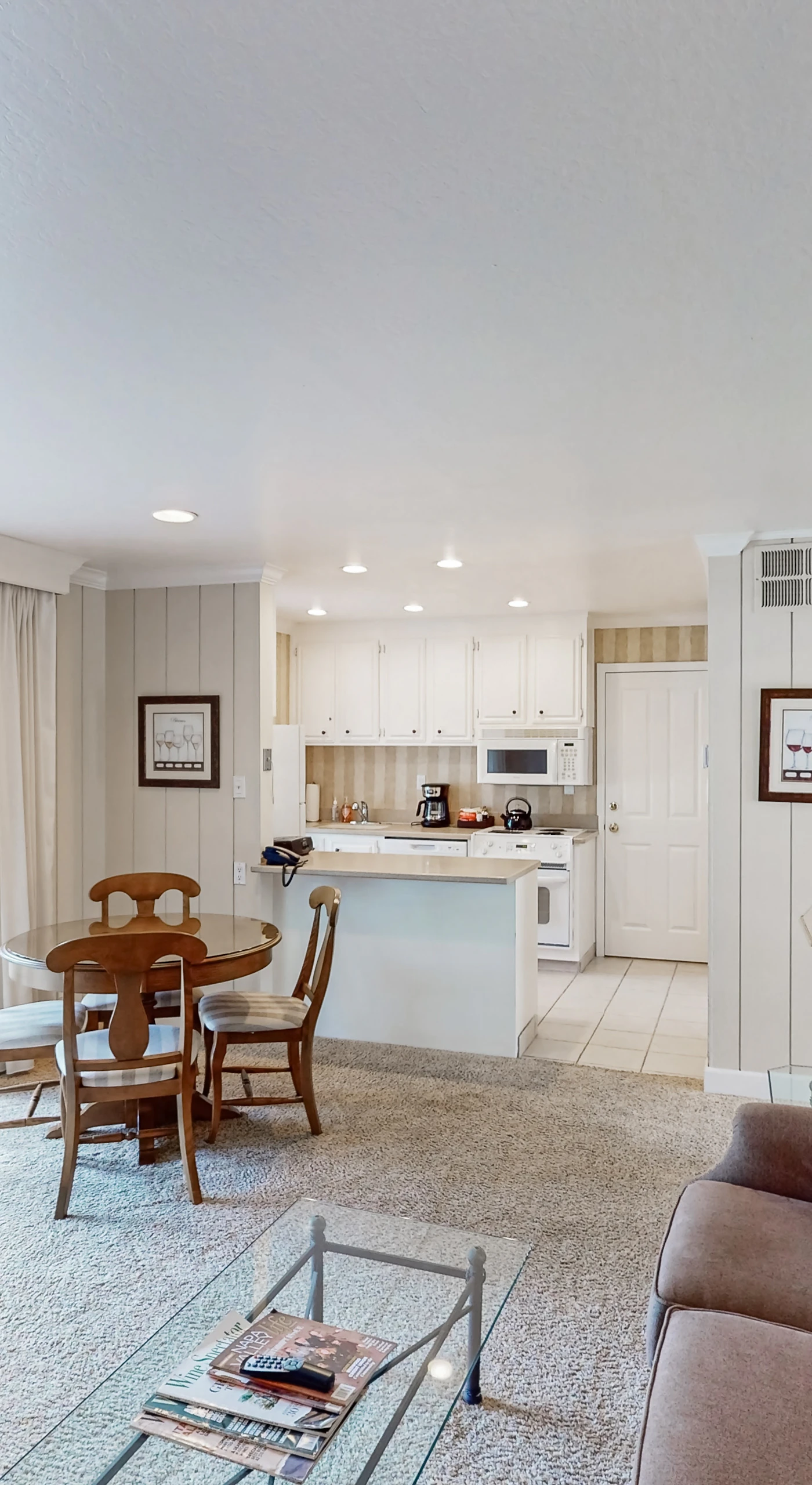 Settle into your sun-filled Napa Valley retreat with an open living area, dining space, and full kitchen — all connected by sliding glass doors to your private patio