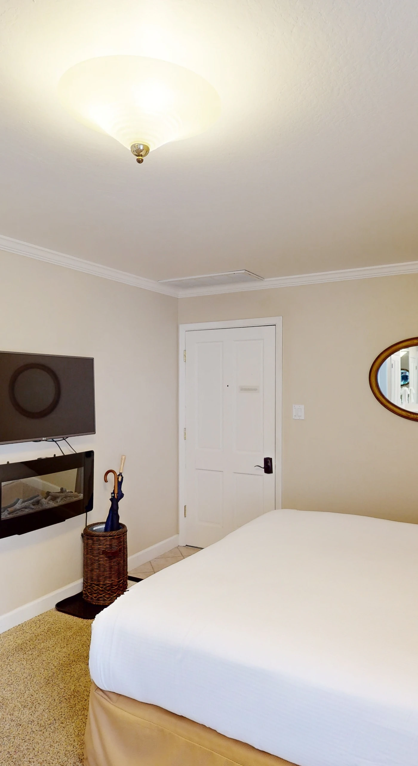 Unwind by the in-room fireplace and flat-screen TV after exploring Napa's acclaimed wineries — your king bed and cozy armchair are ready for you.