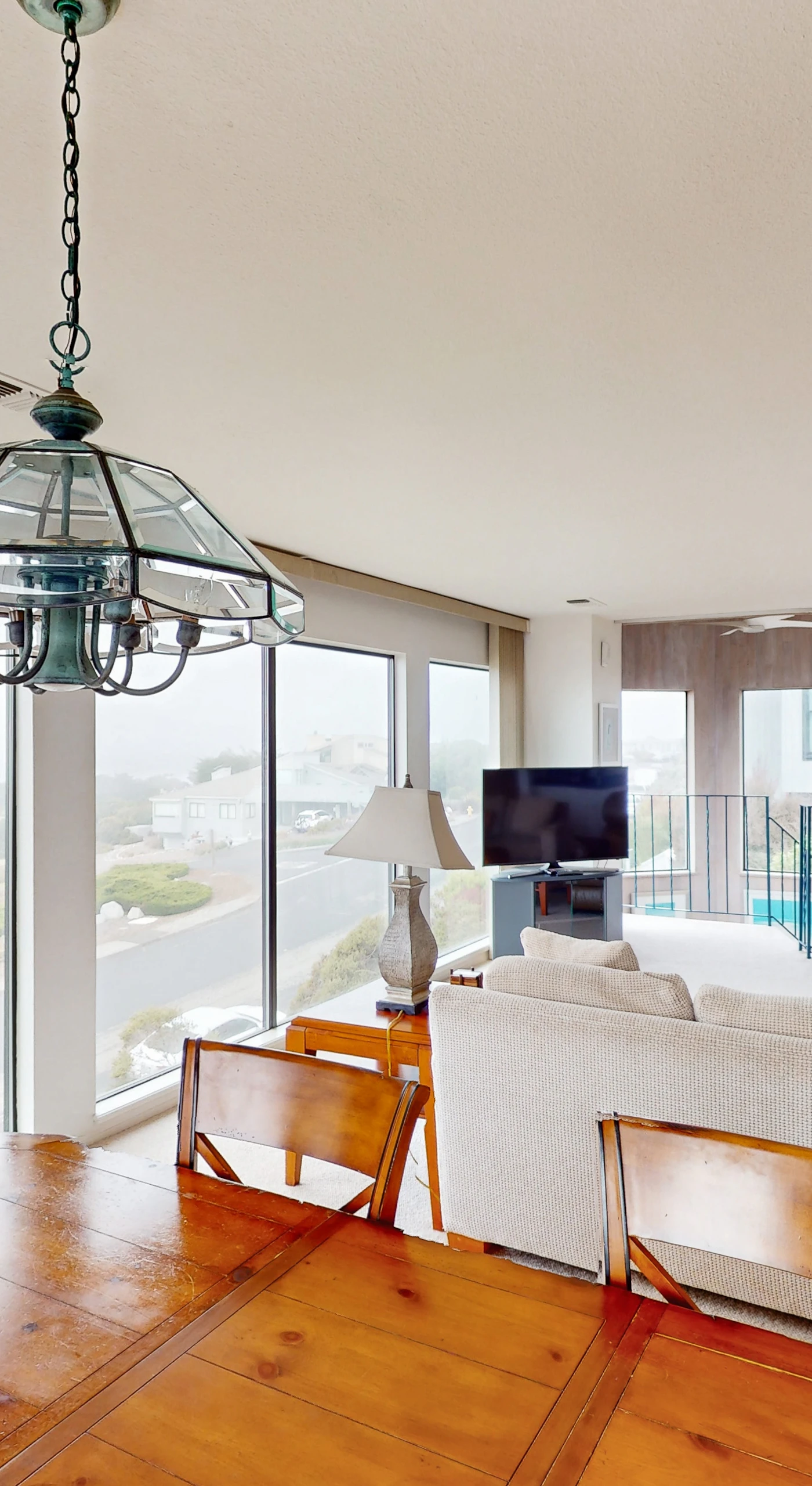 Gleaming hardwood floors connect your dining and living spaces in this airy Bodega Bay retreat with ocean views from every angle