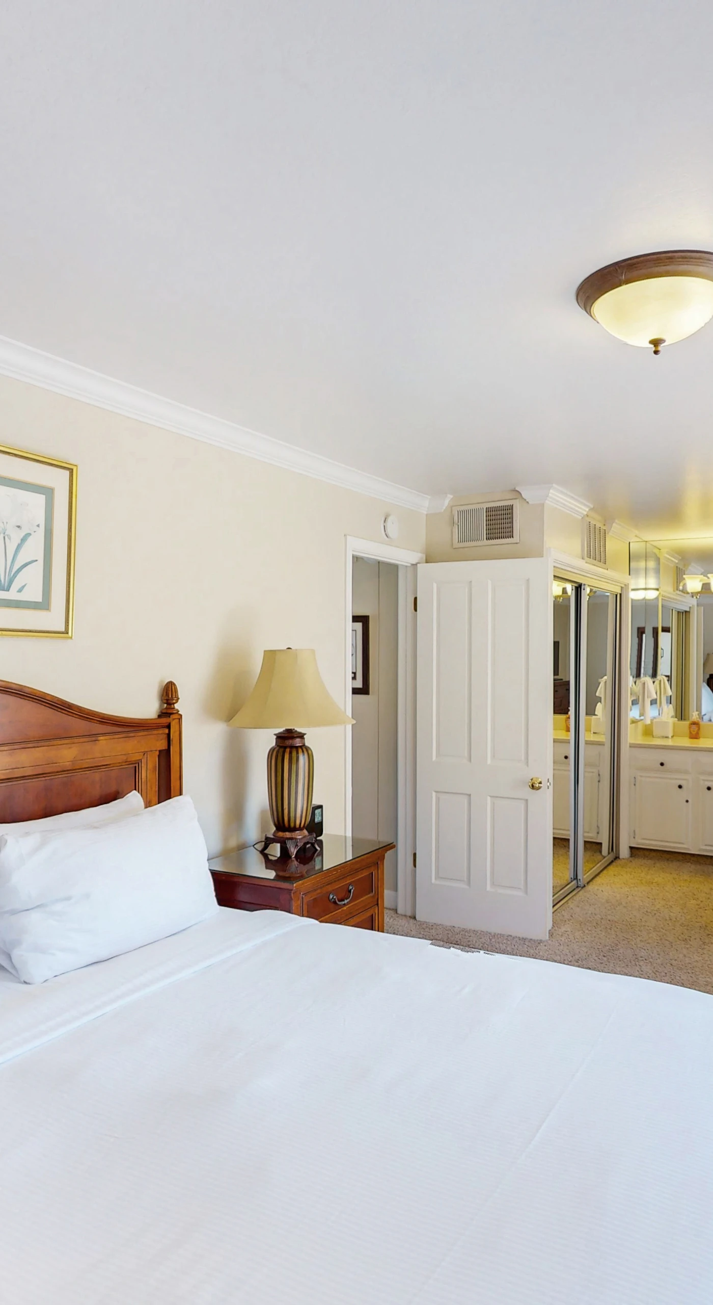 Your master suite features a king bed, en-suite bath, and a cozy reading chair — wake up refreshed and ready for another day in Napa Valley.