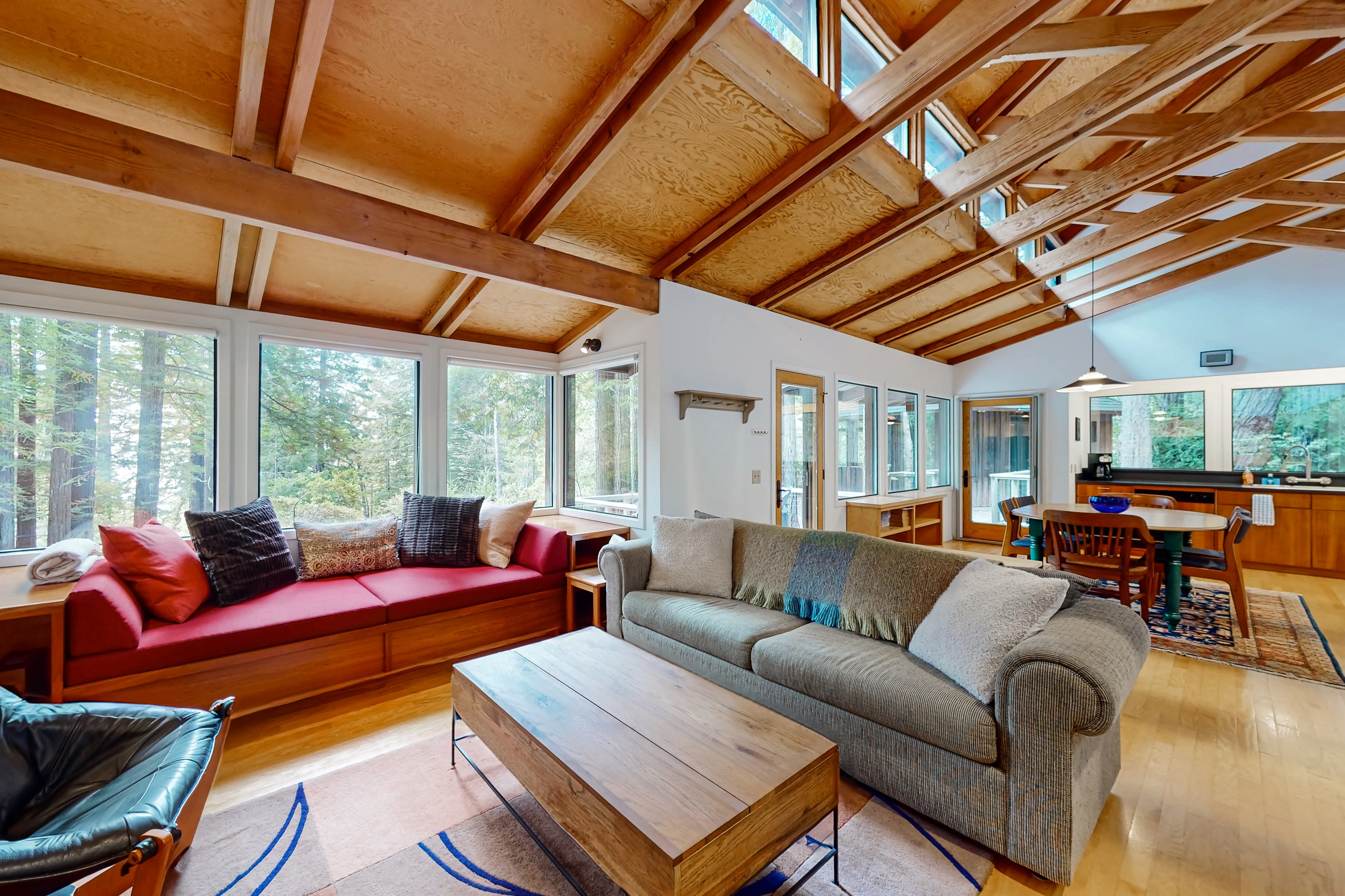 Natural light floods the spacious living room, inviting you to relax on plush seating after a day of exploring.