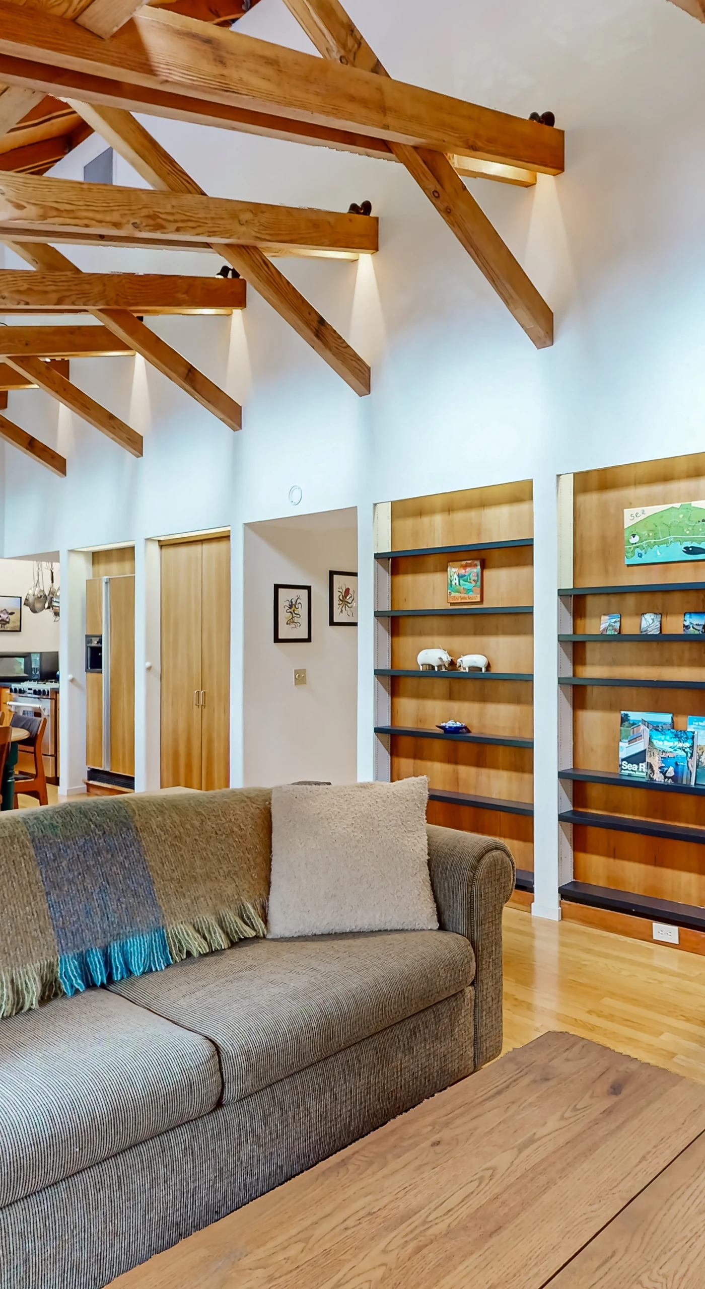 Gather around the warmth of the red wood stove, creating a perfect ambiance for game nights or quiet retreats.