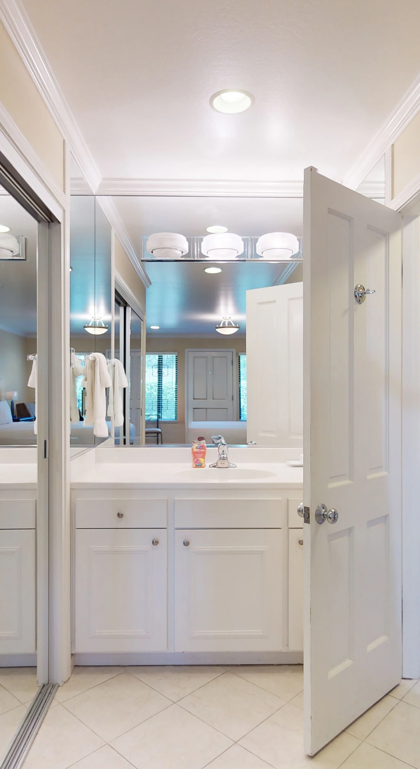 Freshen up in your bright, spacious bathroom — a generous vanity with full-length mirrors gives you plenty of room to get ready for a Napa Valley evening out.
