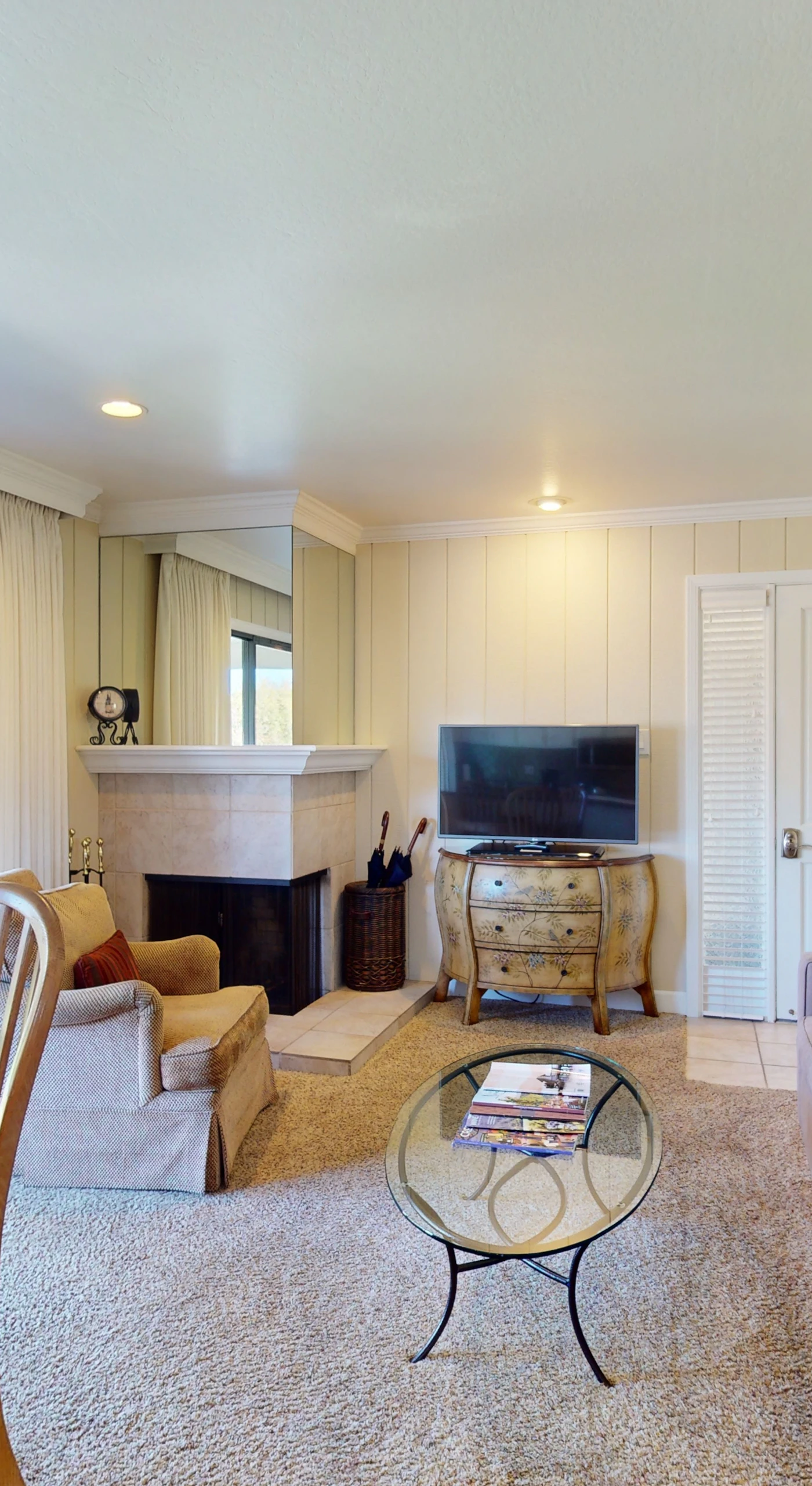 Unwind after a day exploring Napa wineries in your spacious living room — cozy up by the gas fireplace while enjoying views through the sliding glass doors.