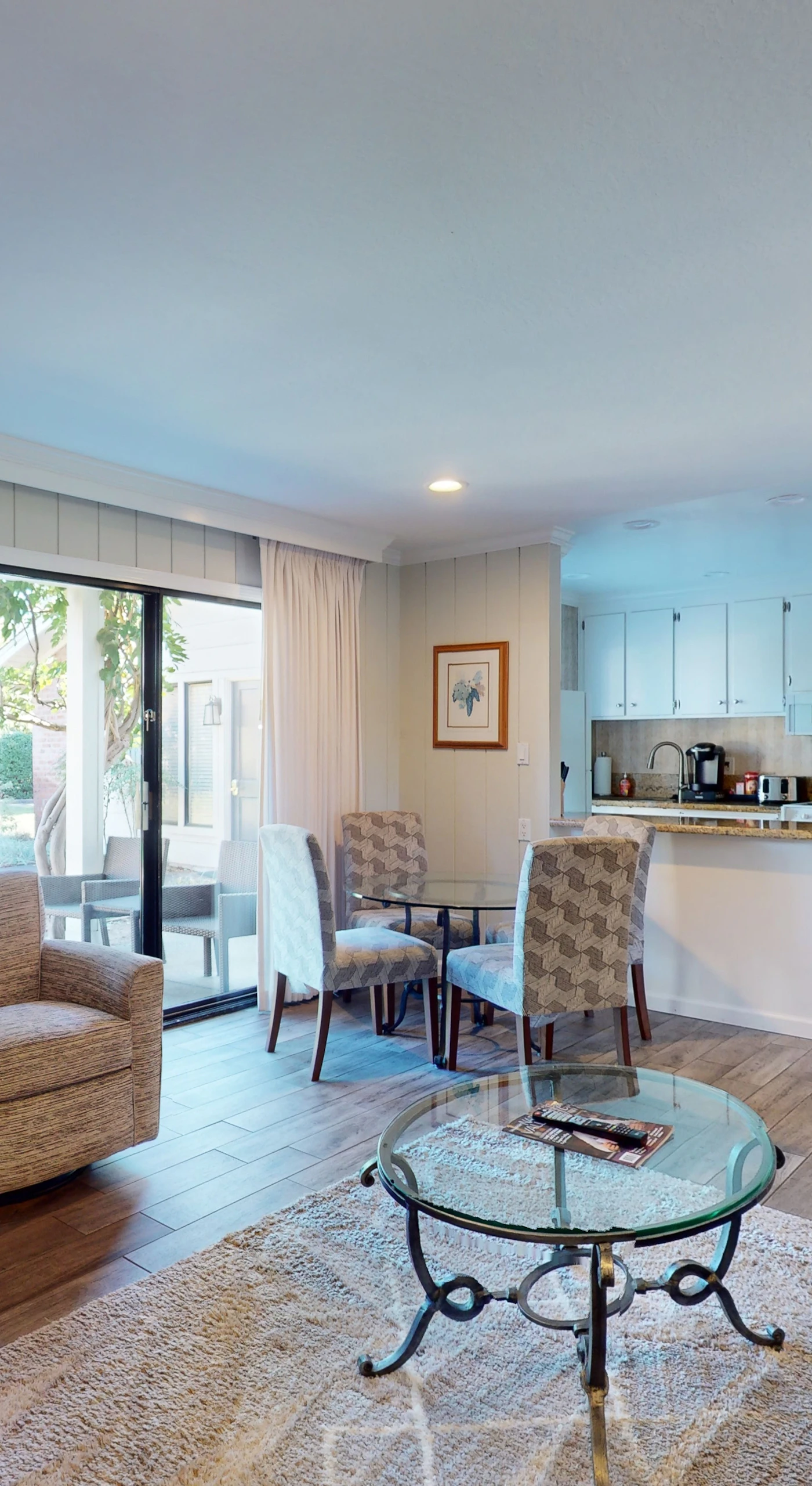 Settle into your sun-filled Napa Valley retreat with open-plan living, plush seating, and a breakfast bar perfect for planning your next wine country adventure.