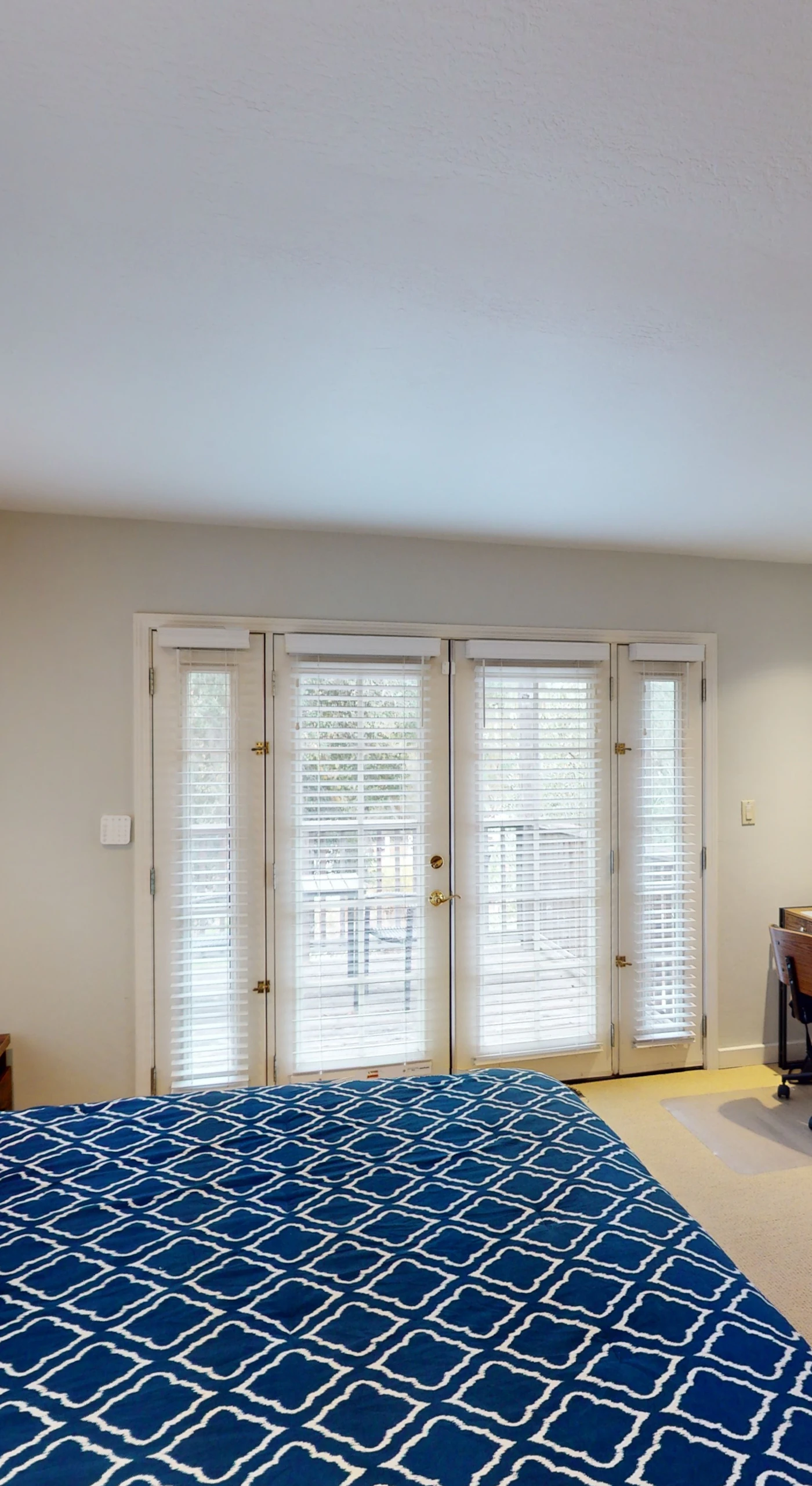 Retreat to your serene master suite with a plush king bed and French doors opening to the patio — fall asleep to the quiet sounds of Glen Ellen.