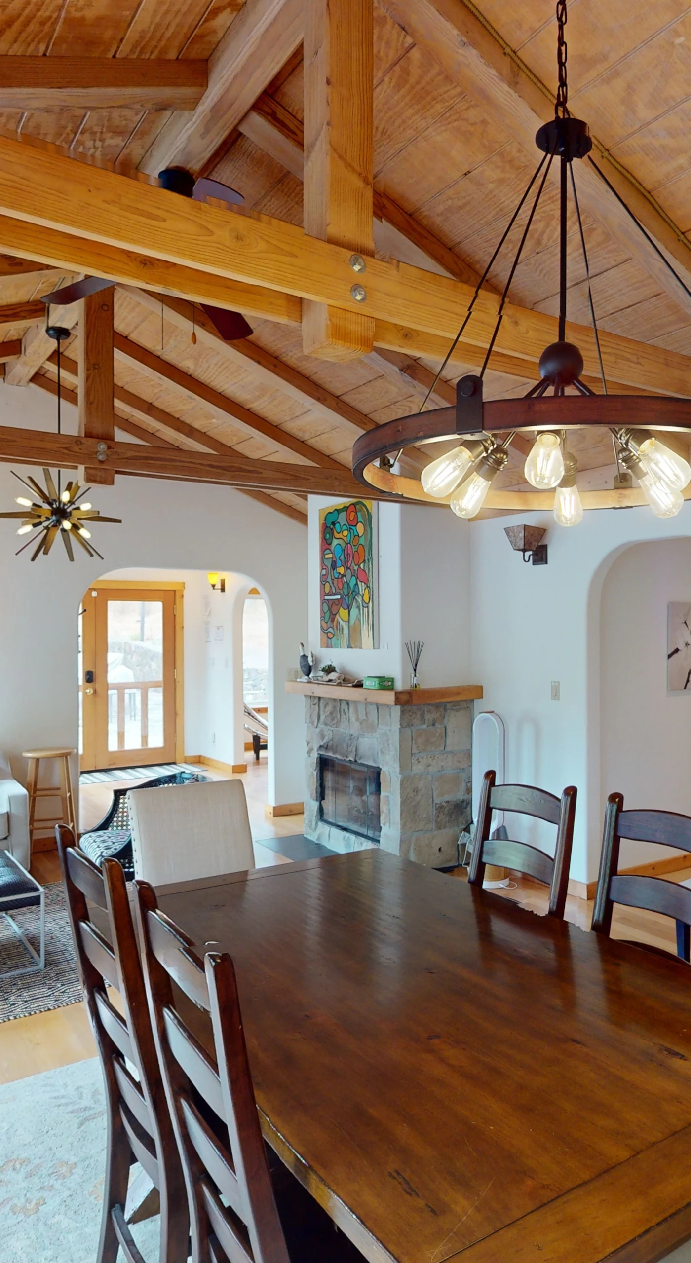 Toast your Glen Ellen getaway at this elegant dining space — a wrought-iron chandelier and arched doorways add Sonoma Valley charm to every meal.