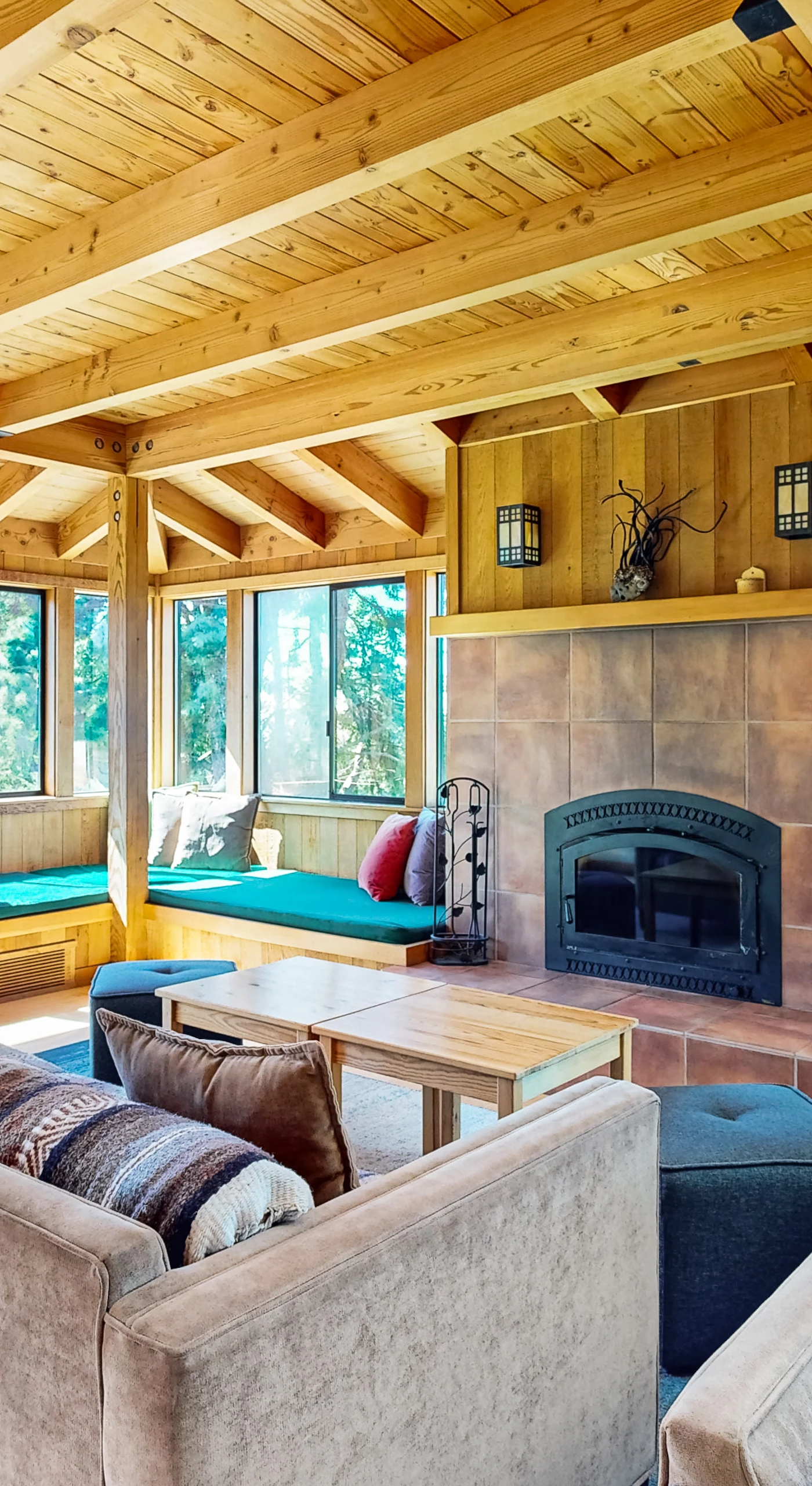 Bask in the warmth of the fireplace while taking in the breathtaking views from this stylish living room.