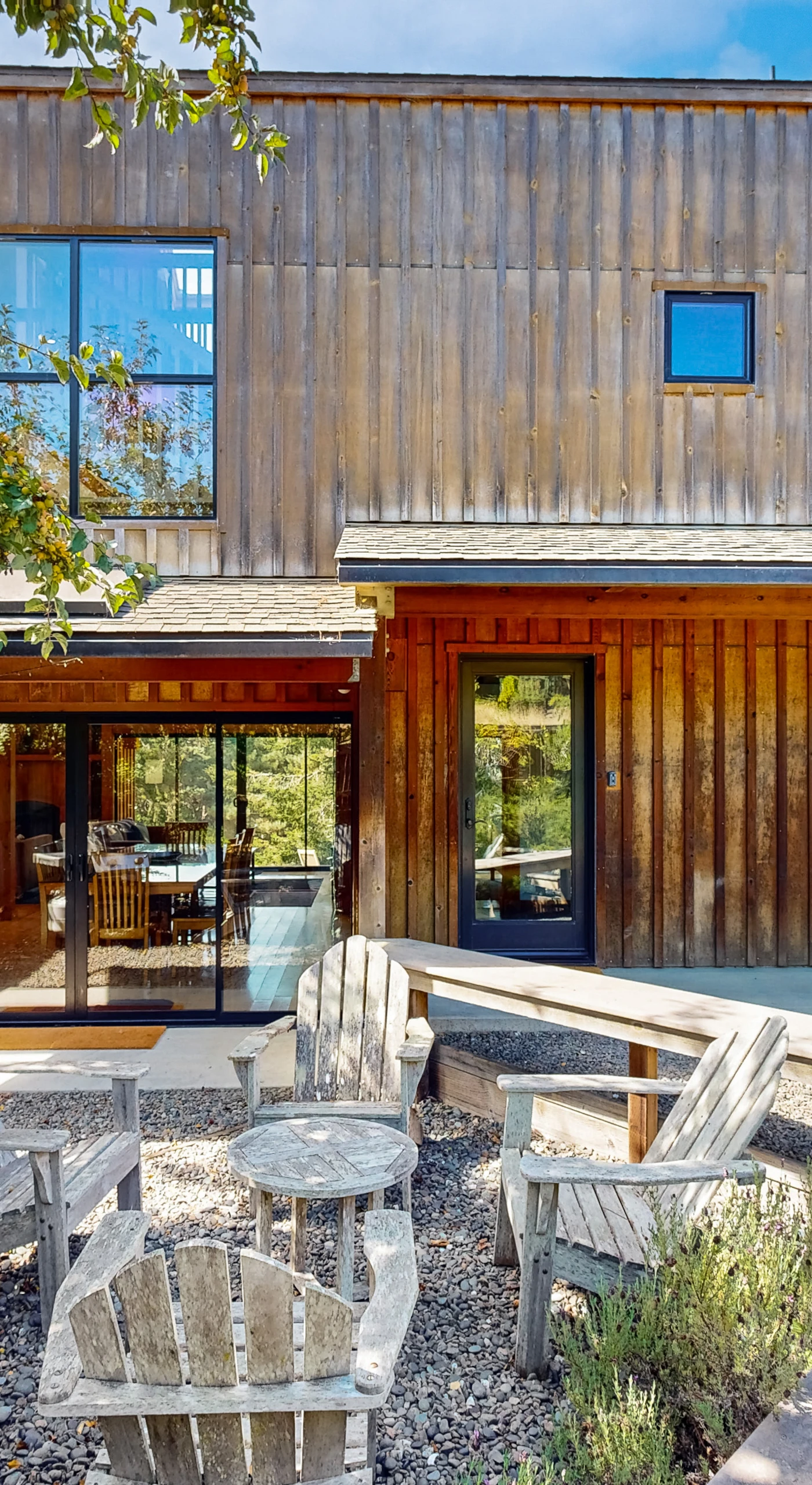 Step outside to your private oasis, where lounge chairs and a fire pit invite you to unwind under the coastal sun.