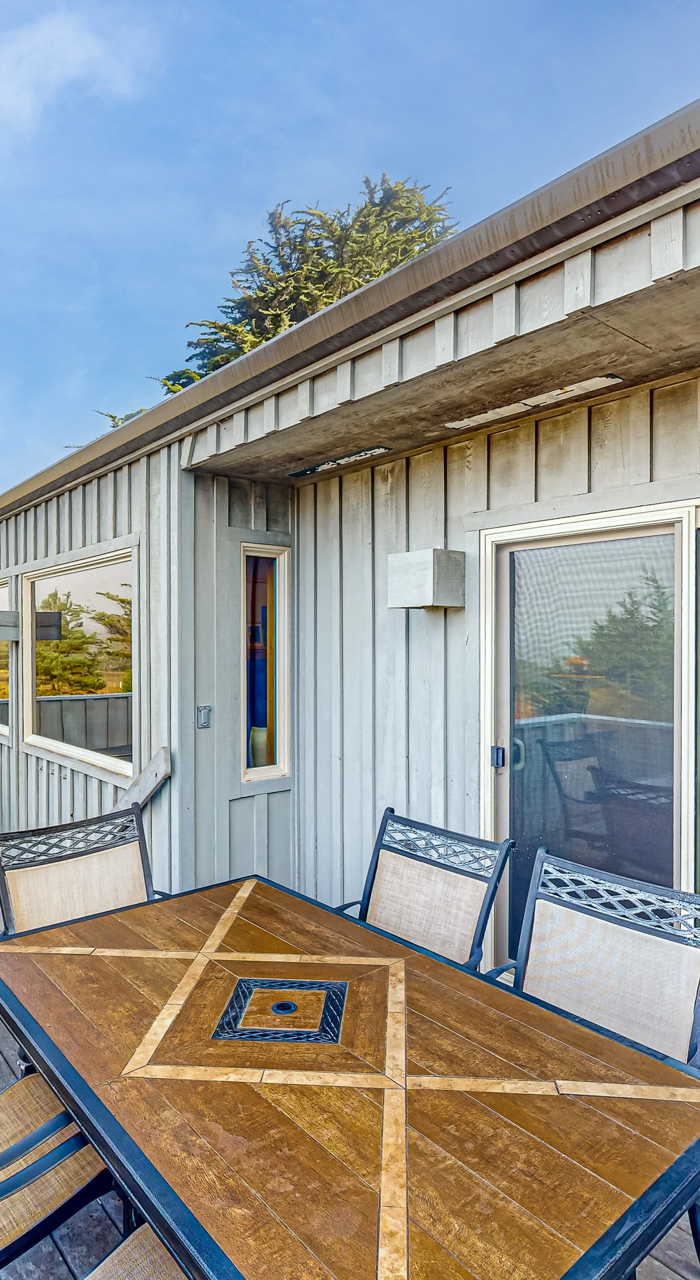 Dine al fresco on the deck, where you can savor meals surrounded by the beauty of nature and fresh coastal air.