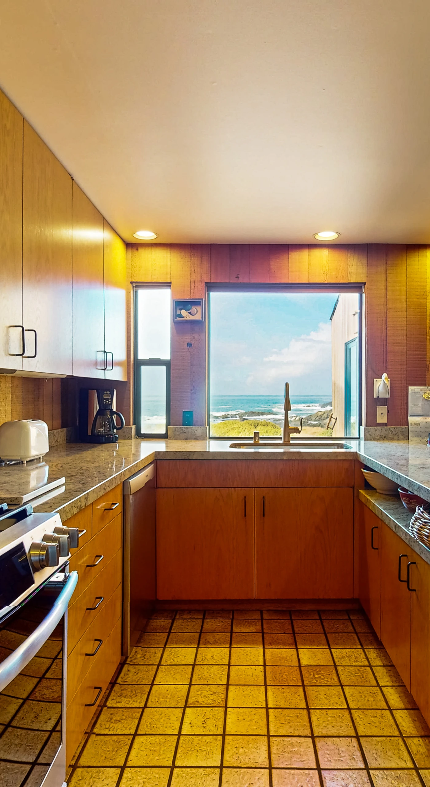 Cook up your favorite meals in this spacious kitchen, designed with ocean views to inspire your culinary creativity.