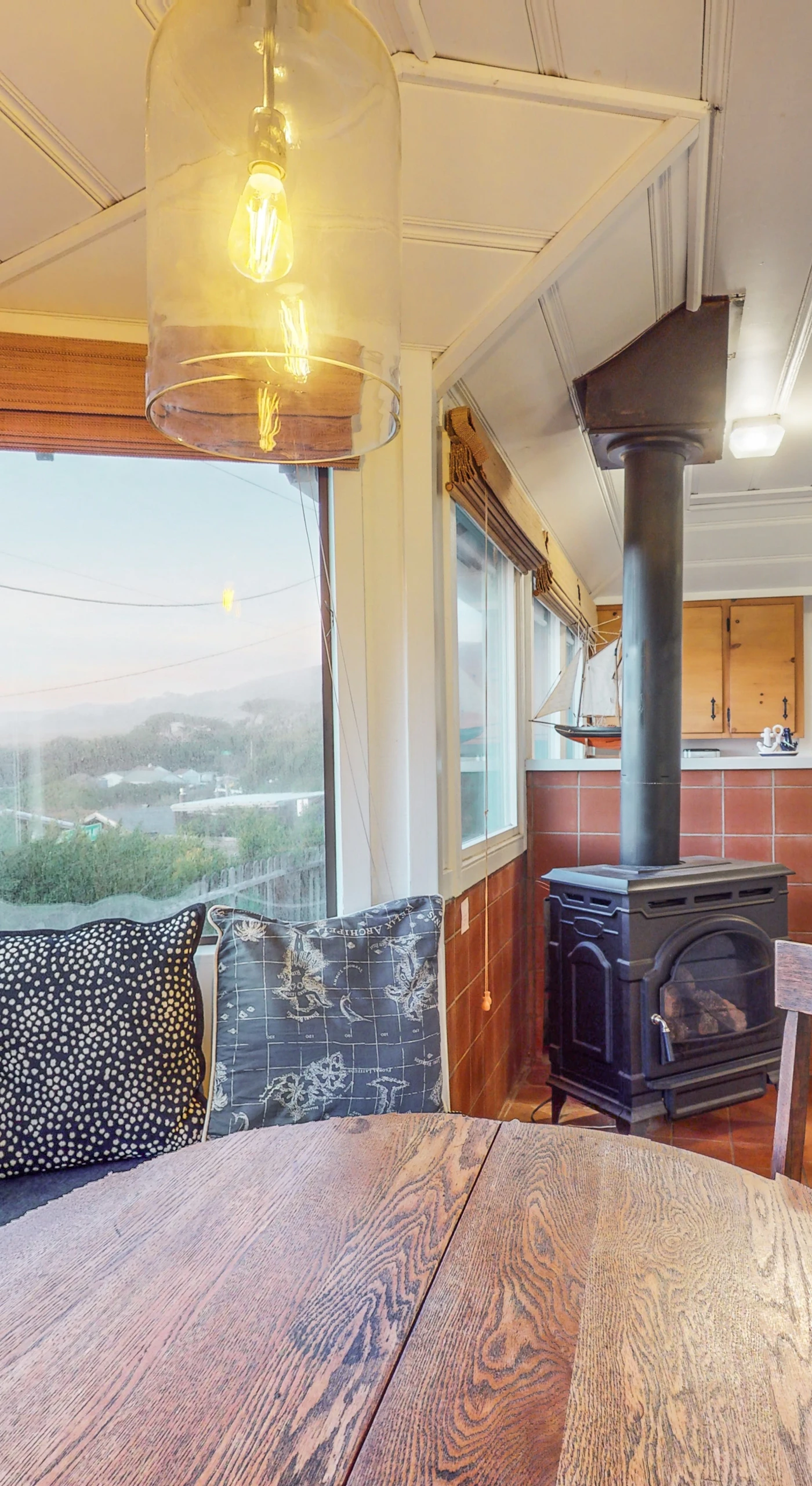 From cozy wood stove warmth to panoramic Sonoma Coast views, your dining nook wraps you in the best of Bodega Bay cottage living.