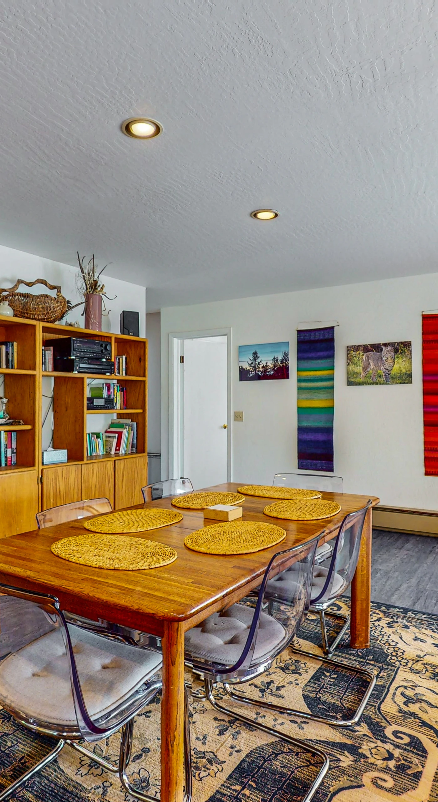 Share meals and stories around the dining table, designed for laughter and connection, with easy access to the lovely living area.